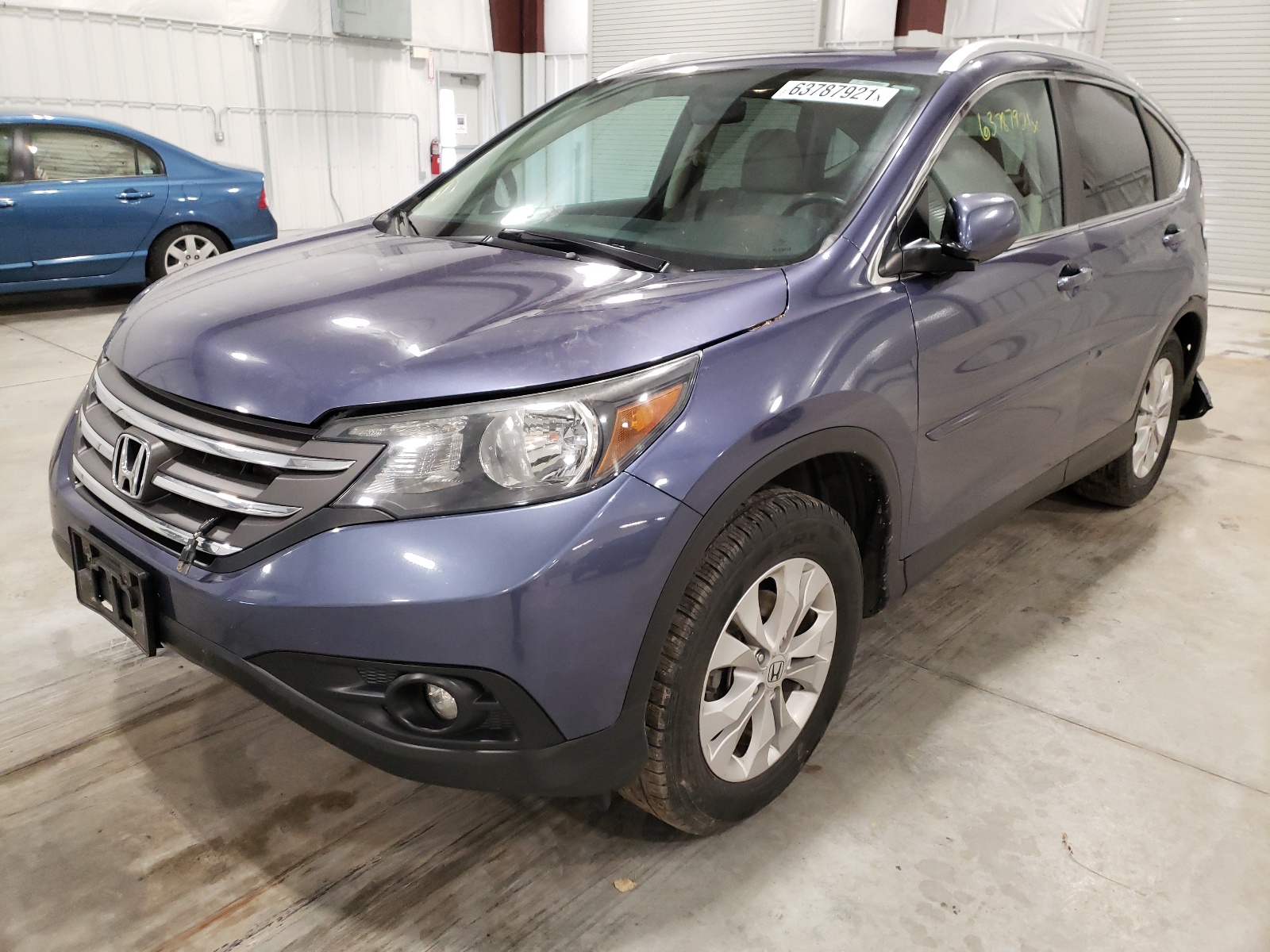 Photo 2 from auction – 2014 HONDA CR-V EXL with VIN 2HKRM4H76EH645251