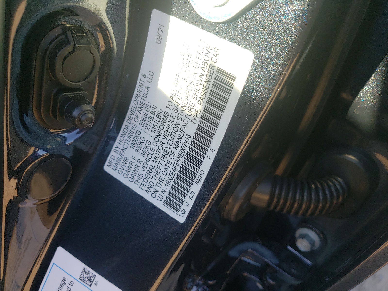 Photo 10 from auction – 2022 HONDA INSIGHT EX with VIN 19XZE4F55NE007916