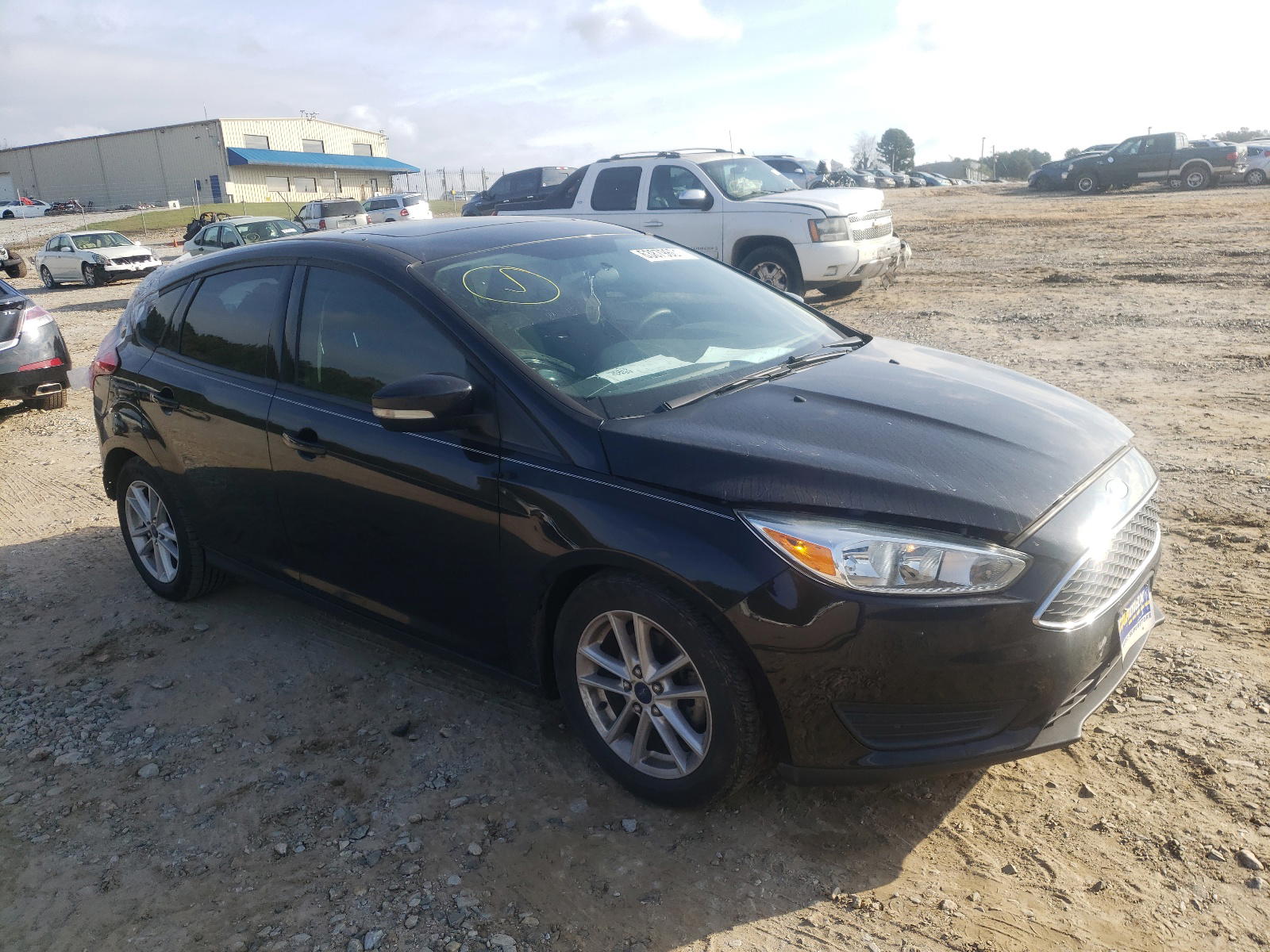 FORD FOCUS SE 2015 with VIN 1FADP3K22FL292180 - Photo from auction