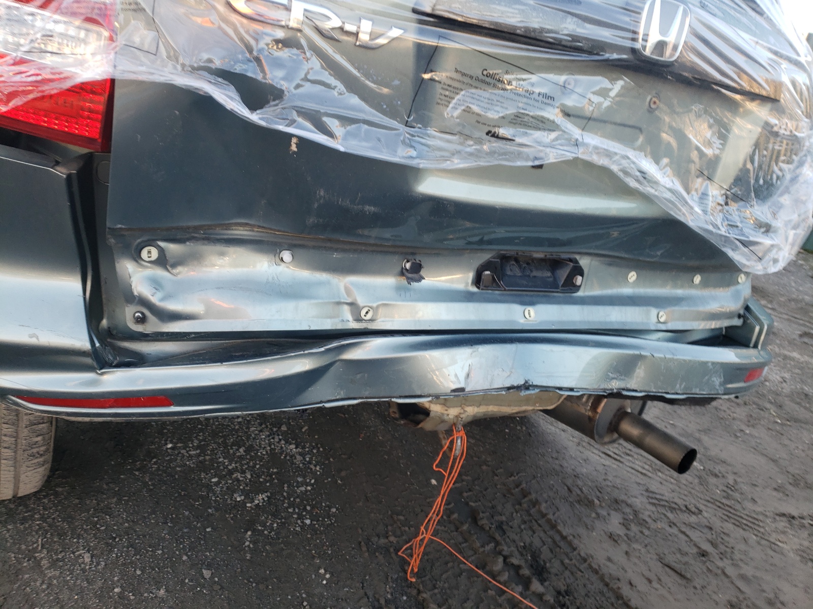 Photo 9 from auction – 2011 HONDA CR-V SE with VIN 5J6RE4H40BL107438
