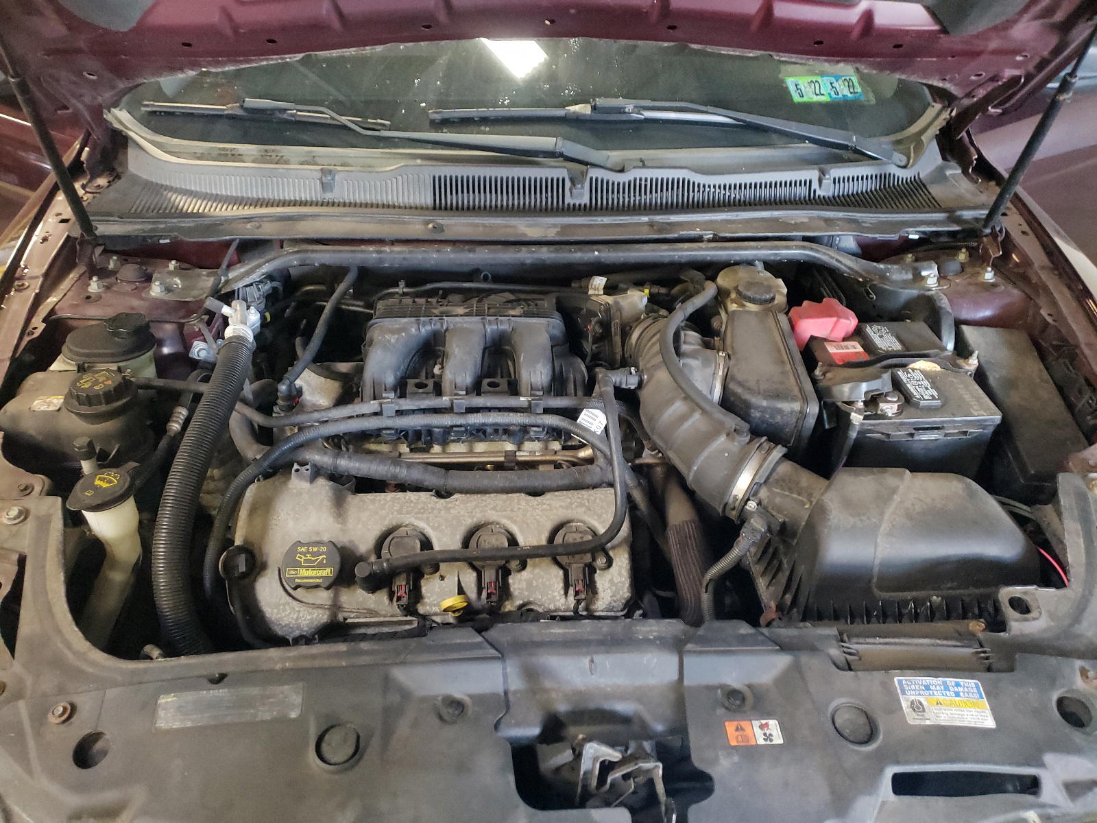 Photo 7 from auction – 2011 FORD TAURUS SE with VIN 1FAHP2DW8BG109802