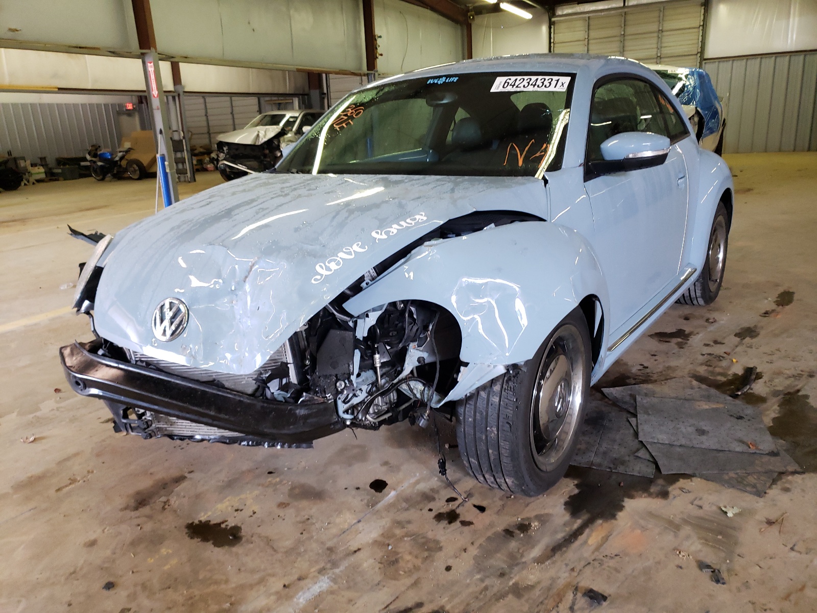 Photo 2 from auction – 2013 VOLKSWAGEN BEETLE with VIN 3VWJX7AT2DM619149