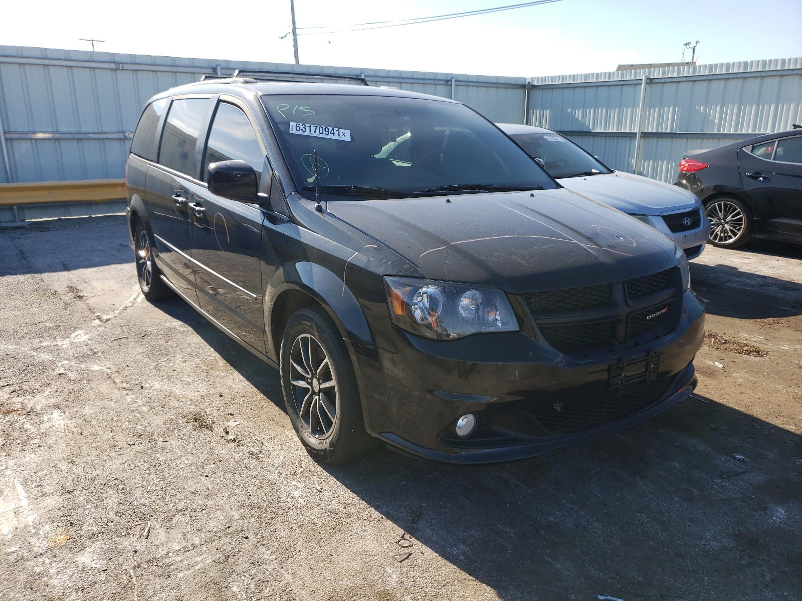 DODGE GRAND CARA 2016 with VIN 2C4RDGEGXGR344462 - Photo from auction