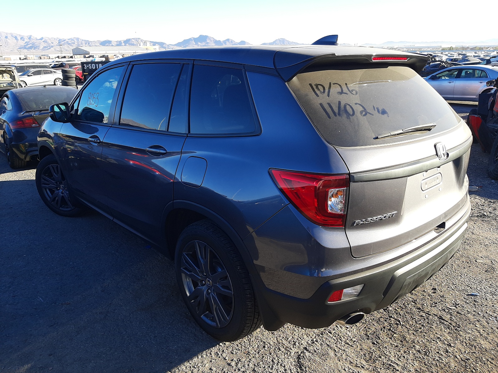 Photo 3 from auction – 2020 HONDA PASSPORT E with VIN 5FNYF7H54LB003984