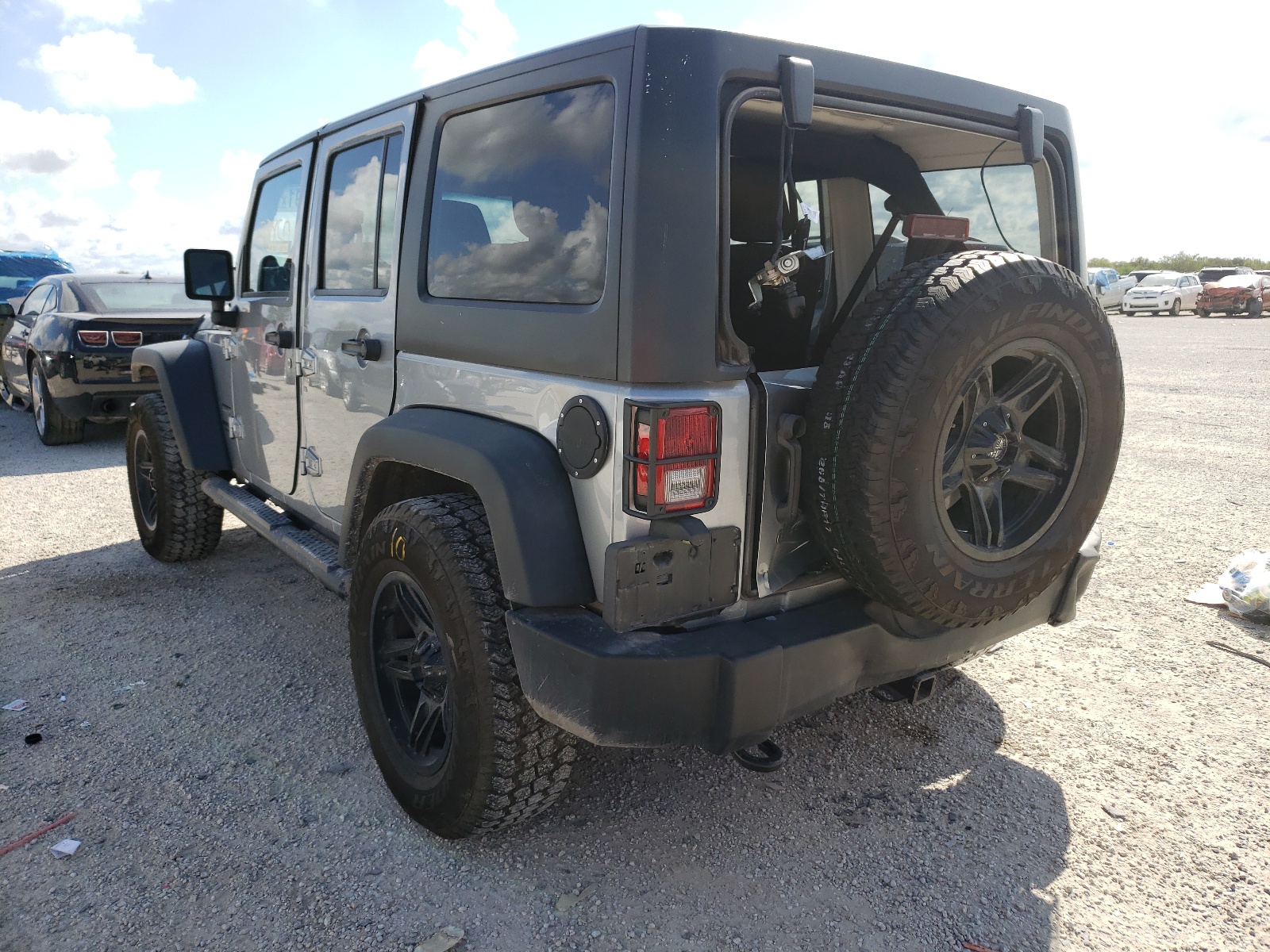 Photo 13 from auction – 2014 JEEP WRANGLER U with VIN 1C4BJWDG6EL320297