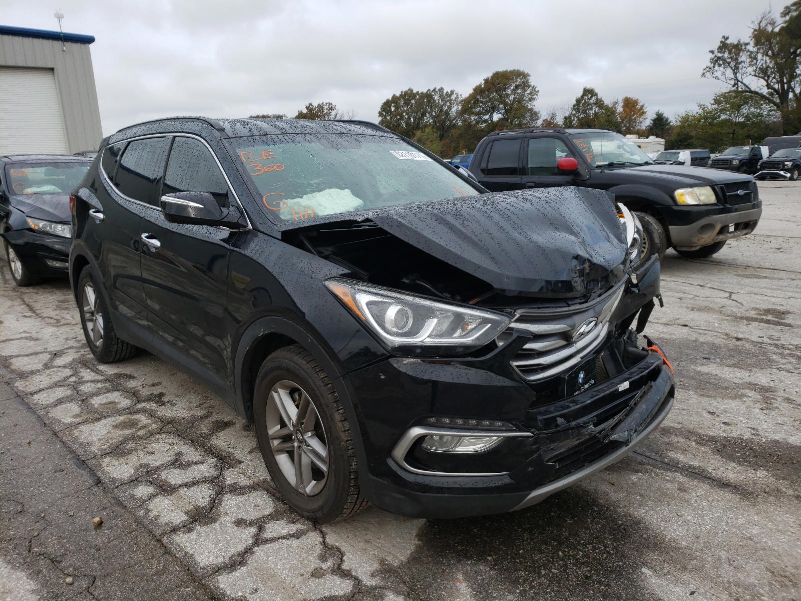 HYUNDAI SANTA FE S 2017 with VIN 5NMZU3LB1HH014740 - Photo from auction