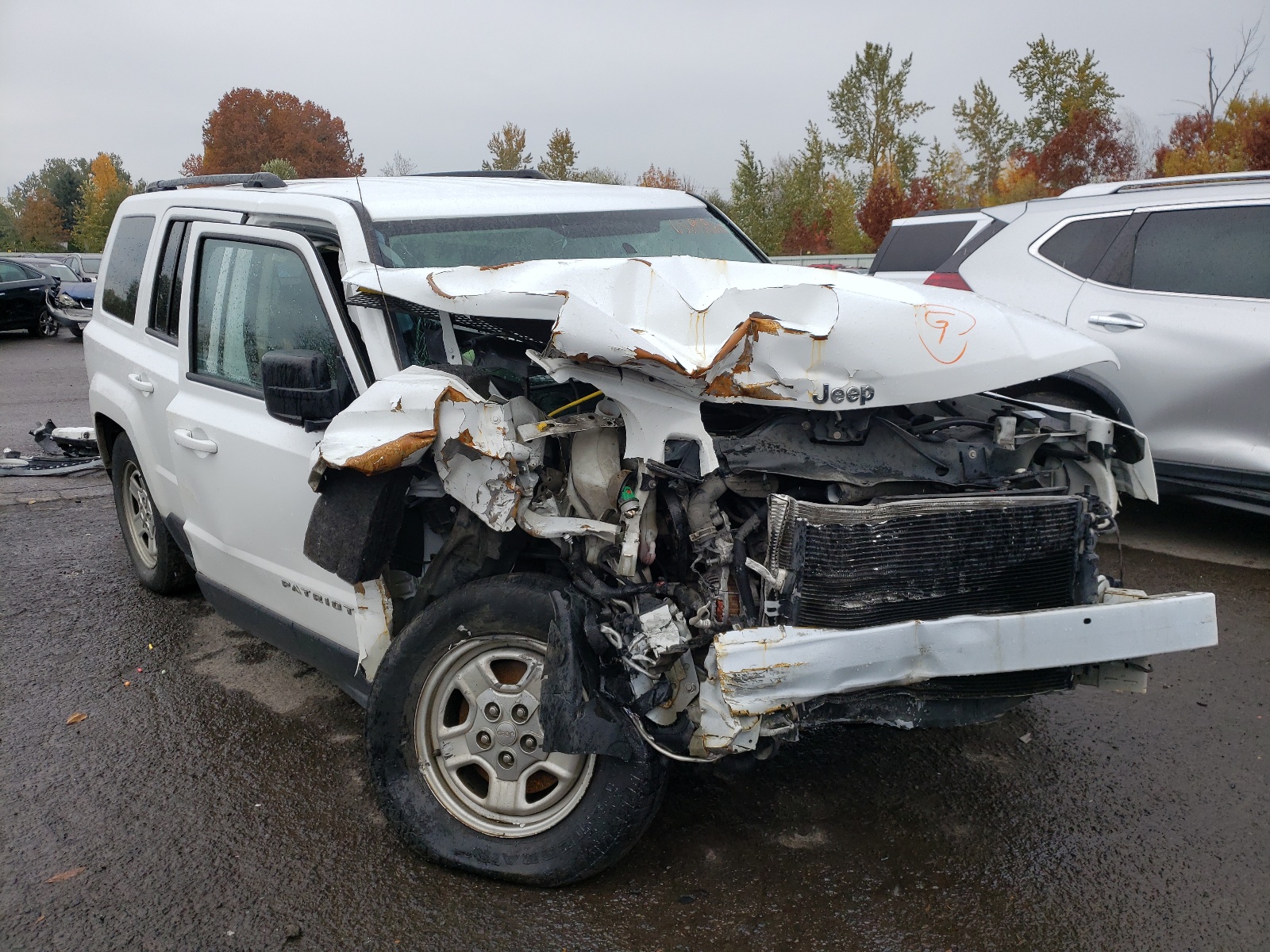 Photo 1 from auction – 2014 JEEP PATRIOT SP with VIN 1C4NJPBA8ED690758