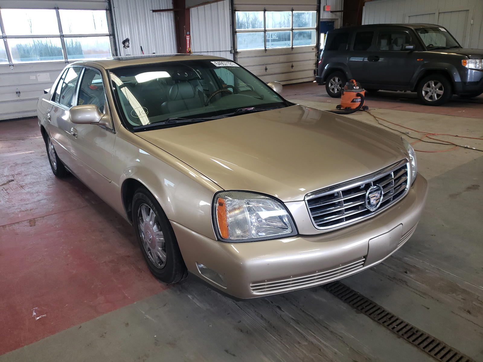 CADILLAC DEVILLE 2005 with VIN 1G6KD54Y75U223889 - Photo from auction