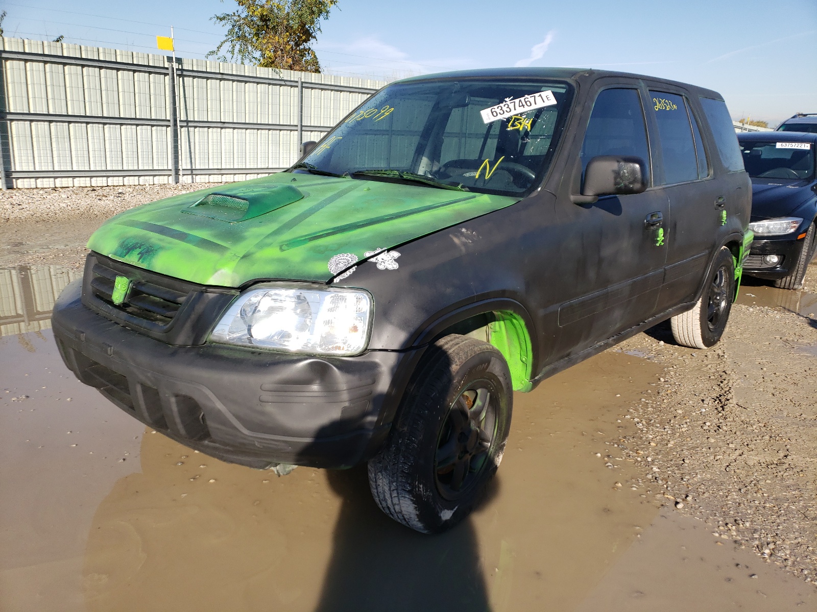 Photo 2 from auction – 1999 HONDA CR-V EX with VIN JHLRD1863XC075099