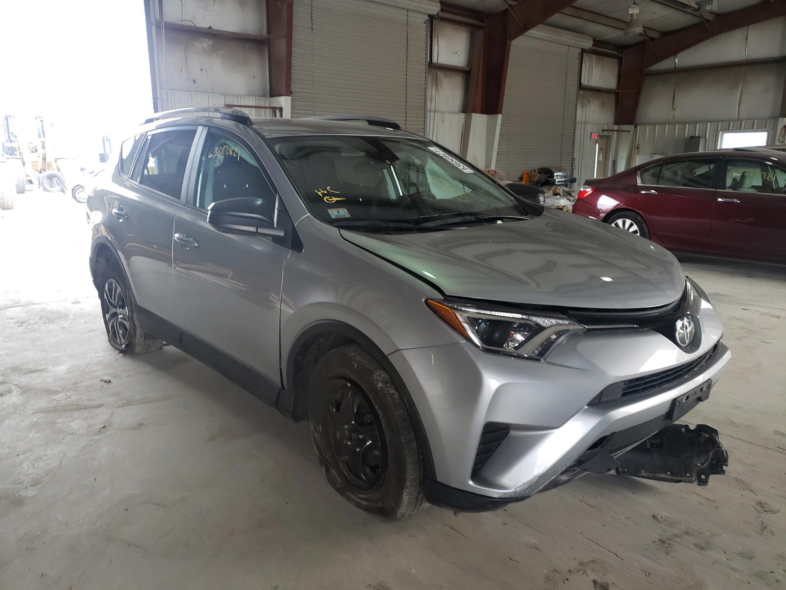 TOYOTA RAV4 LE 2017 with VIN 2T3BFREV0HW573486 - Photo from auction