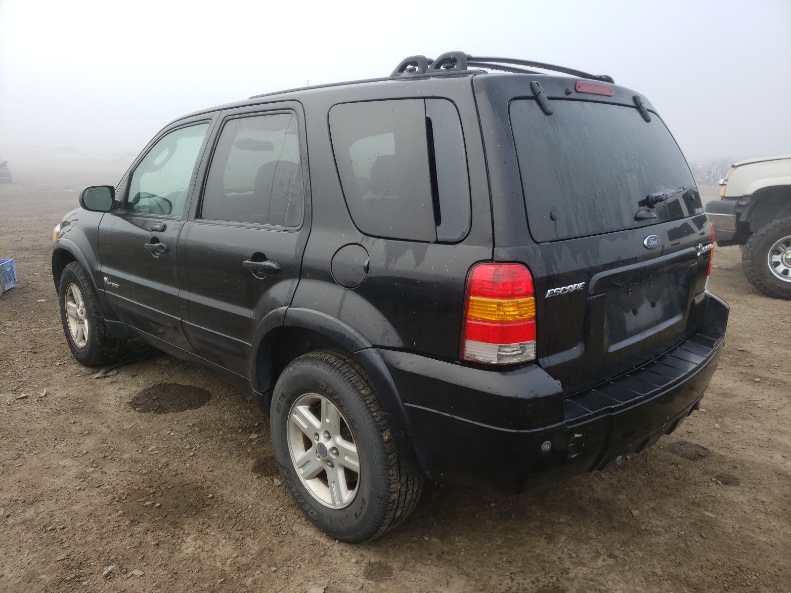 Photo 3 from auction – 2006 FORD ESCAPE HEV with VIN 1FMCU95H56KA08558