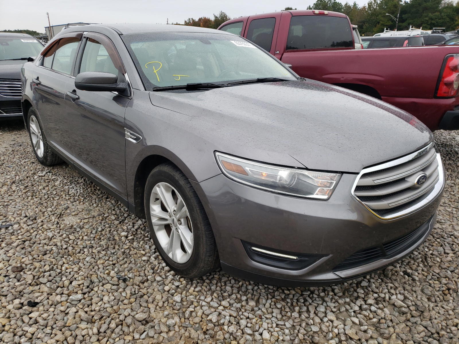 FORD TAURUS SEL 2014 with VIN 1FAHP2E89EG132977 - Photo from auction