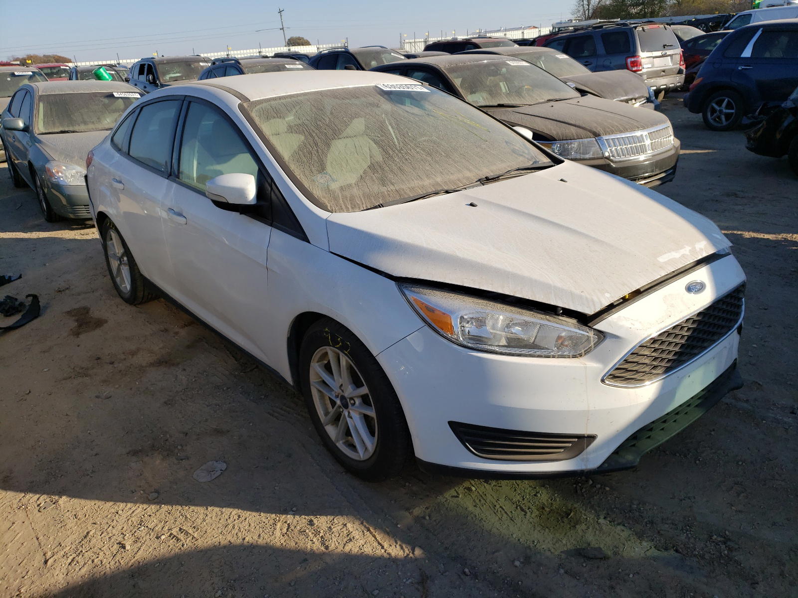 FORD FOCUS SE 2017 with VIN 1FADP3F20HL249616 - Photo from auction
