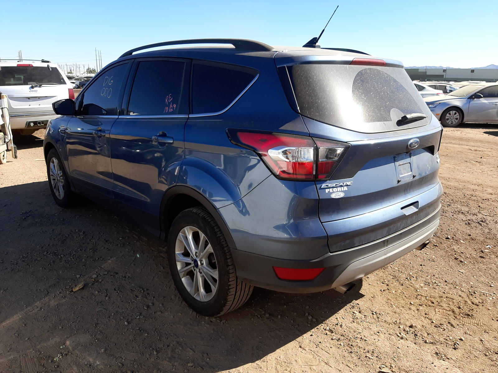 Photo 3 from auction – 2018 FORD ESCAPE SE with VIN 1FMCU0GD8JUB84331