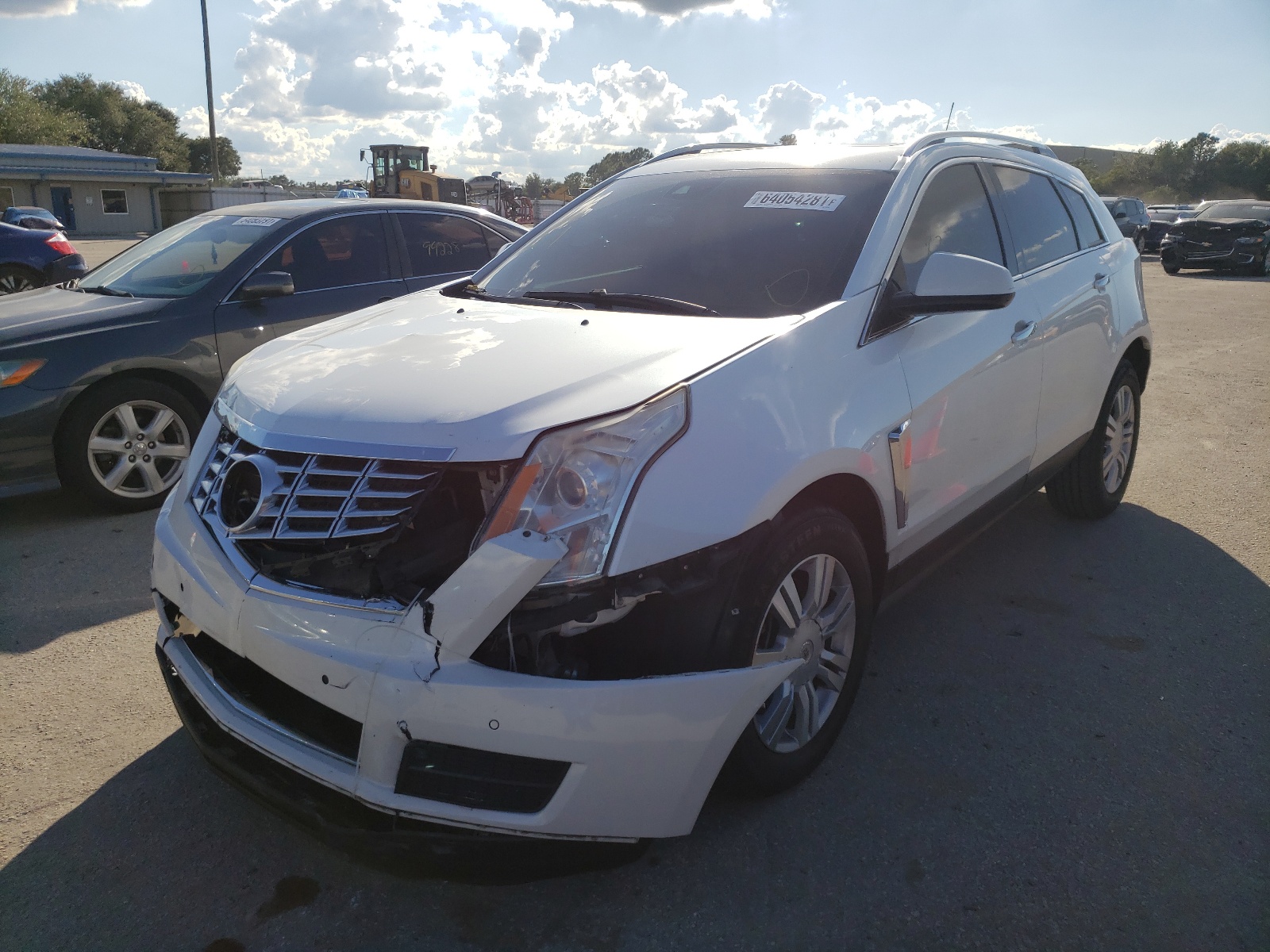 Photo 2 from auction – 2015 CADILLAC SRX LUXURY with VIN 3GYFNBE31FS561104