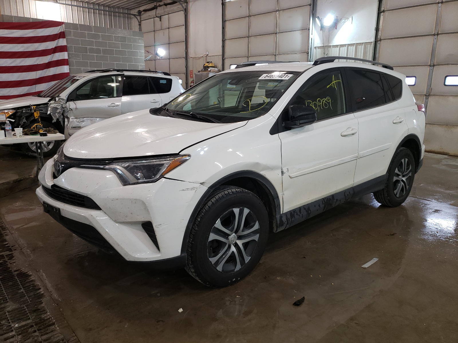 Photo 2 from auction – 2018 TOYOTA RAV4 LE with VIN JTMBFREV3JJ740539