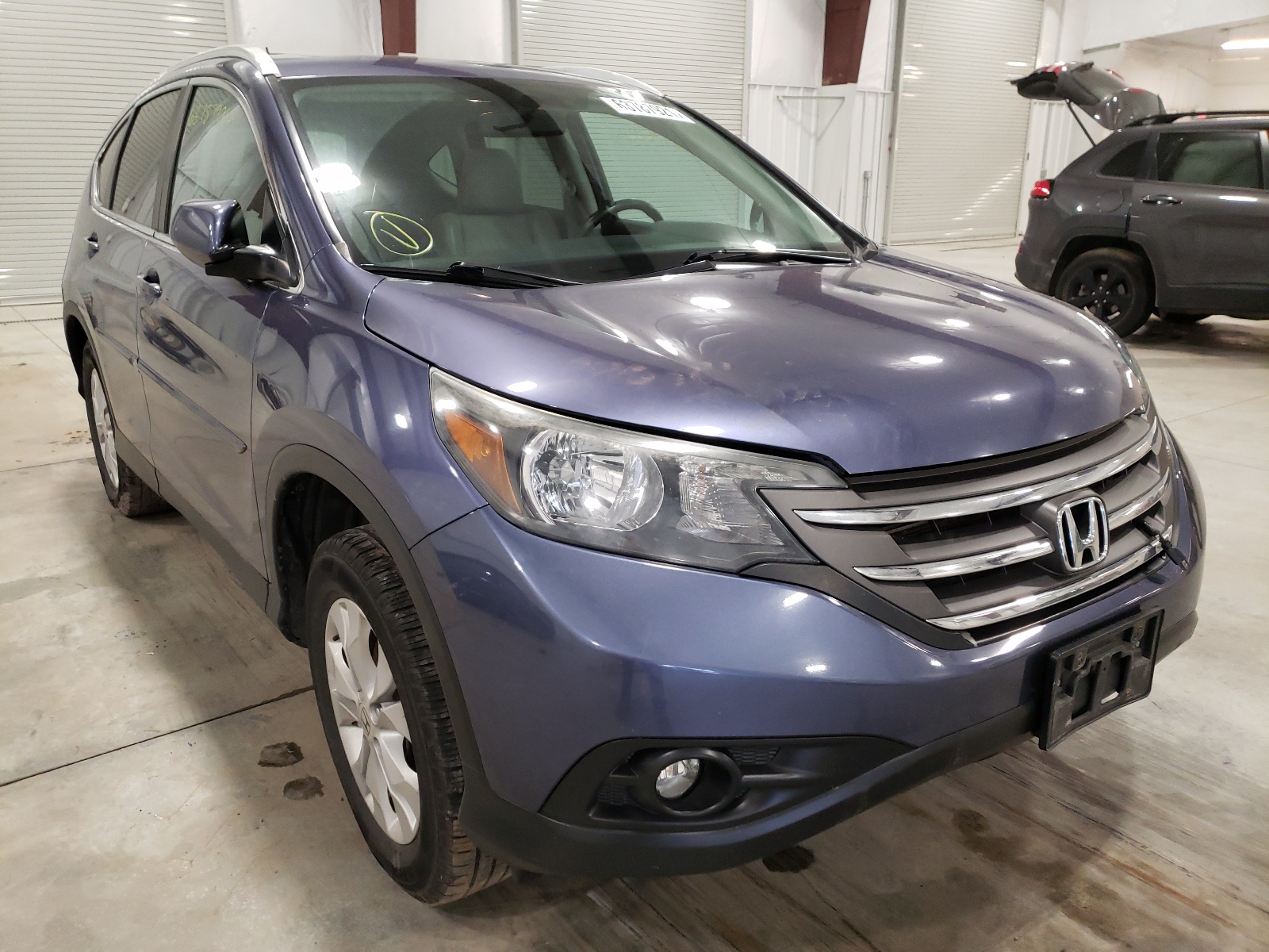 HONDA CR-V EXL 2014 with VIN 2HKRM4H76EH645251 - Photo from auction