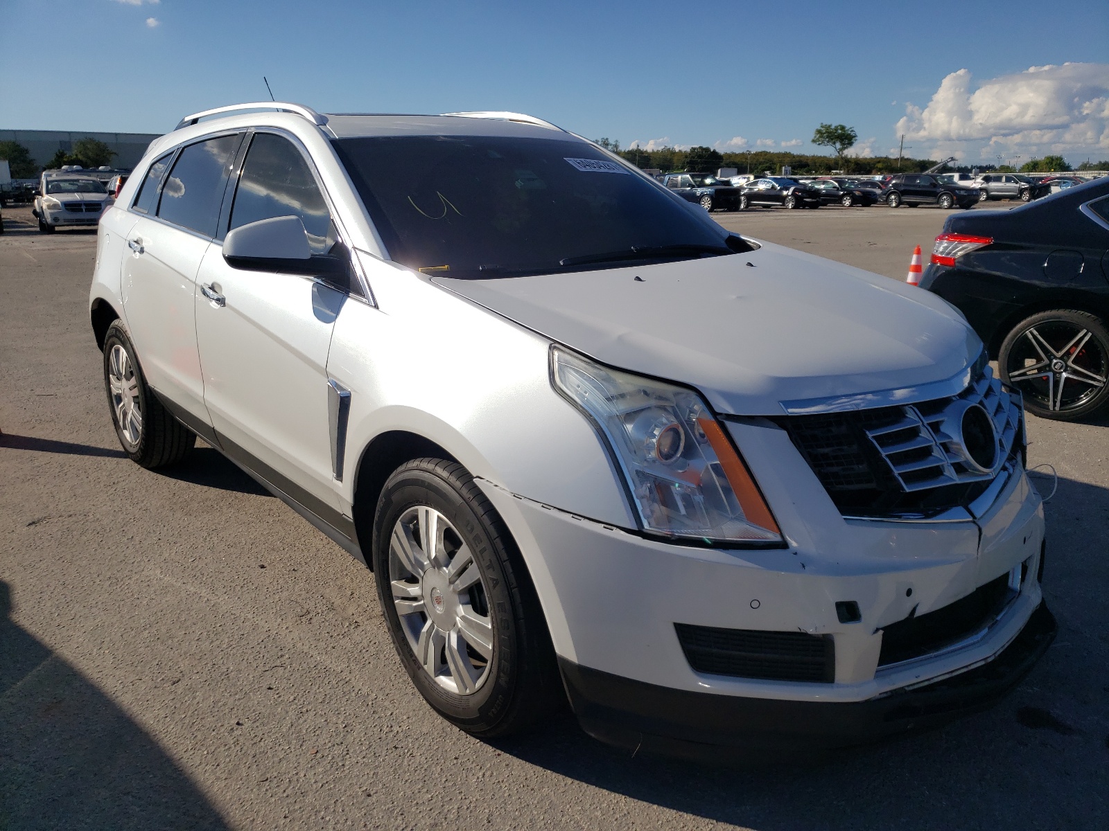CADILLAC SRX LUXURY 2015 with VIN 3GYFNBE31FS561104 - Photo from auction