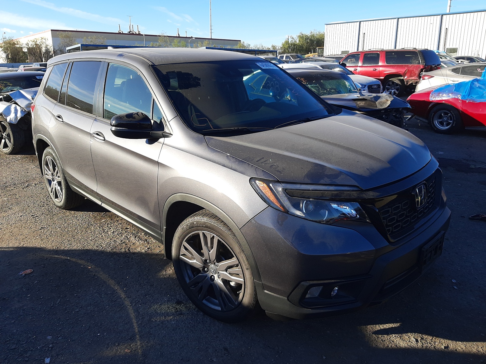 Photo 1 from auction – 2020 HONDA PASSPORT E with VIN 5FNYF7H54LB003984