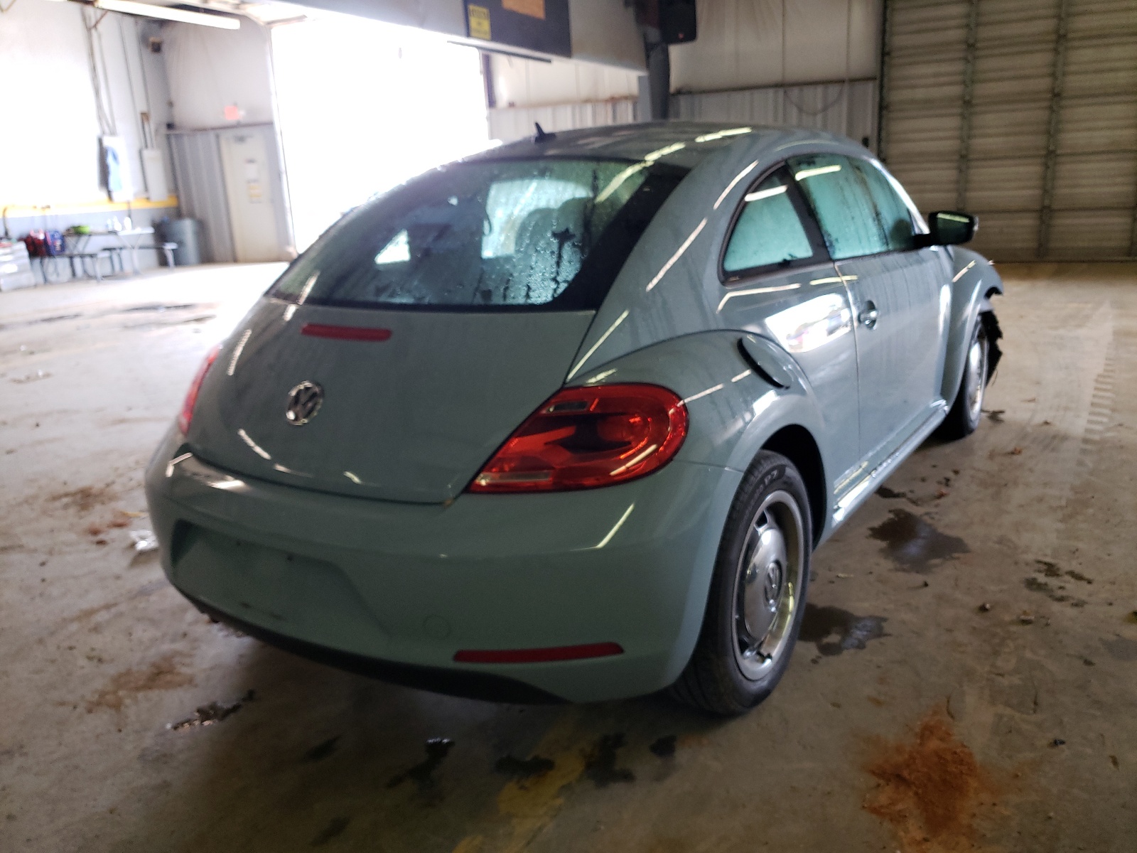 Photo 4 from auction – 2013 VOLKSWAGEN BEETLE with VIN 3VWJX7AT2DM619149