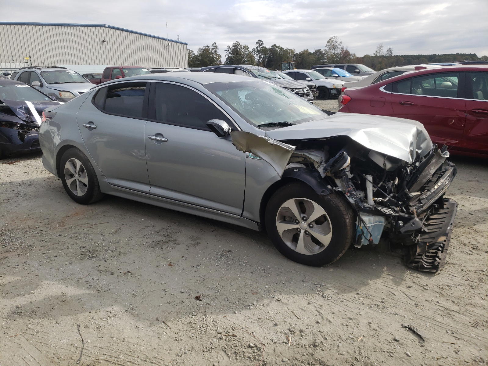 KIA OPTIMA HYB 2014 with VIN KNAGM4AD6E5077037 - Photo from auction