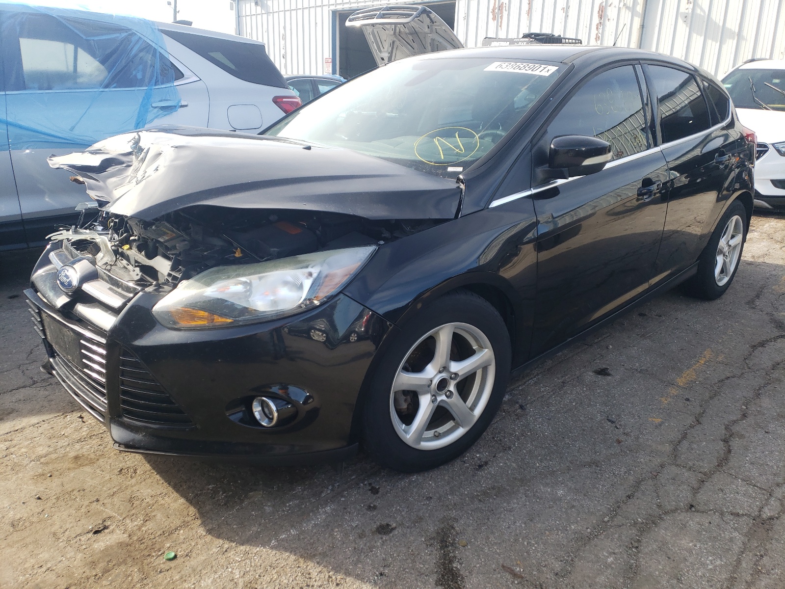 Photo 2 from auction – 2012 FORD FOCUS TITA with VIN 1FAHP3N24CL271548