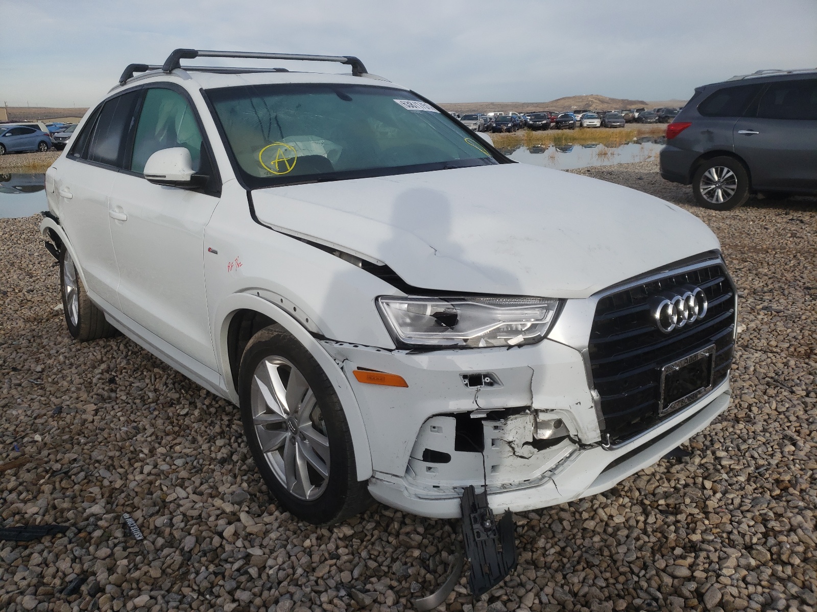 AUDI Q3 PREMIUM 2018 with VIN WA1BCCFS5JR028197 - Photo from auction