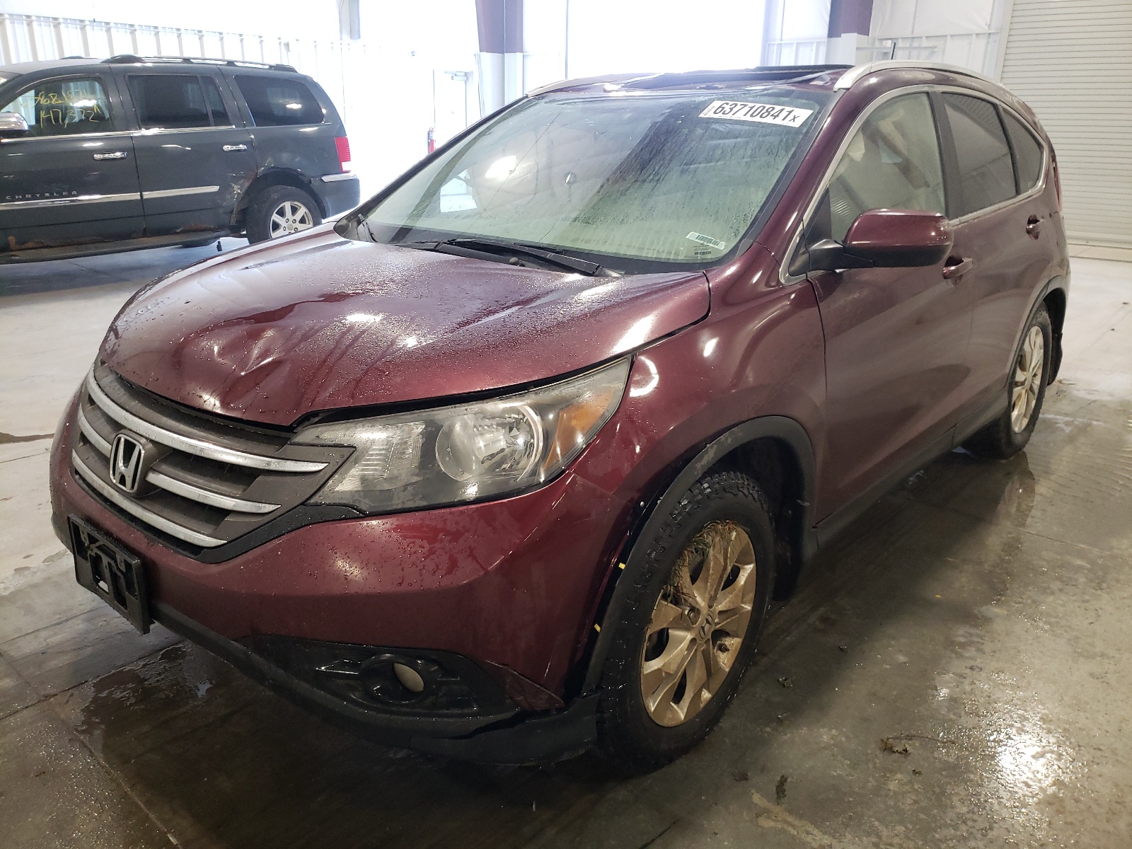 Photo 2 from auction – 2012 HONDA CR-V EXL with VIN 5J6RM4H75CL028040