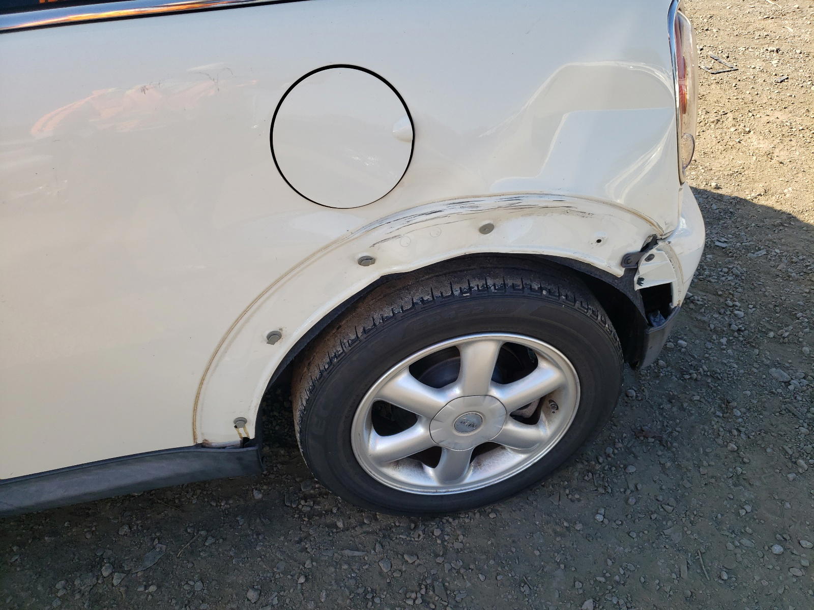 Photo 9 from auction – 2009 MINI COOPER with VIN WMWMF335X9TU71753