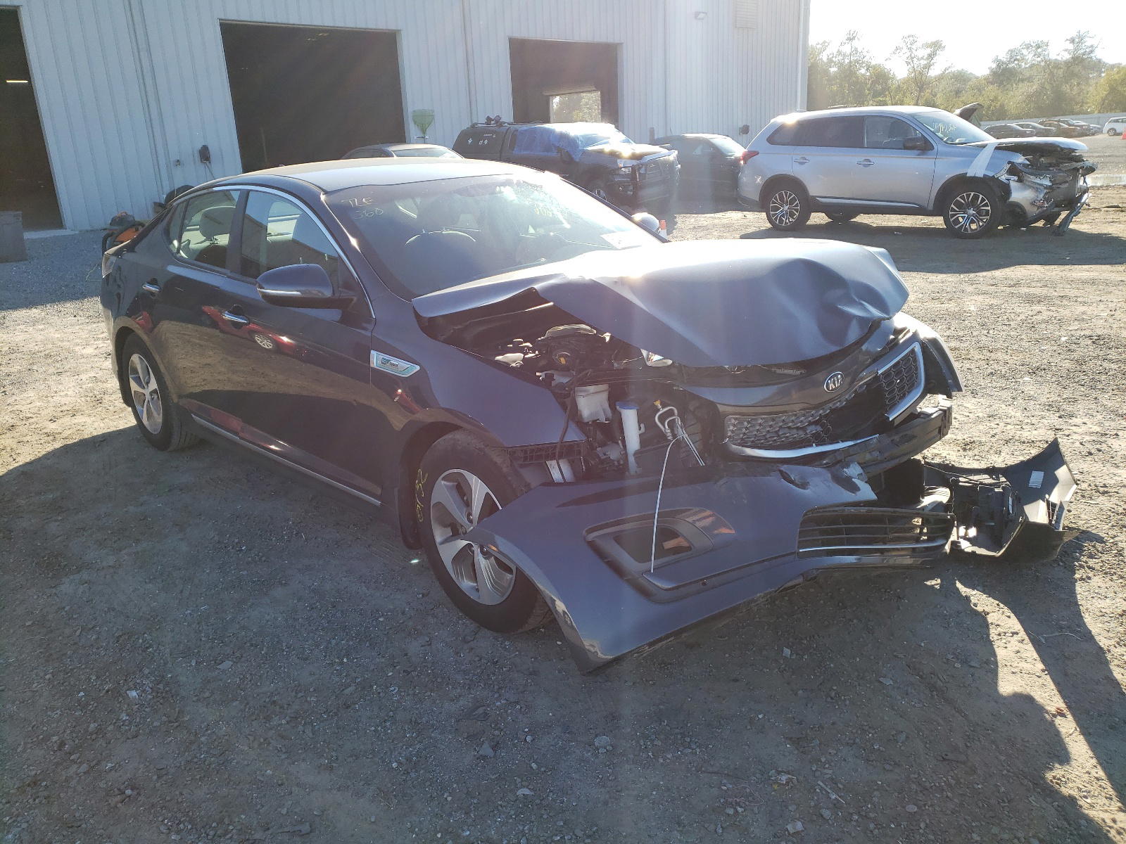 KIA OPTIMA HYB 2014 with VIN KNAGM4AD5E5071231 - Photo from auction