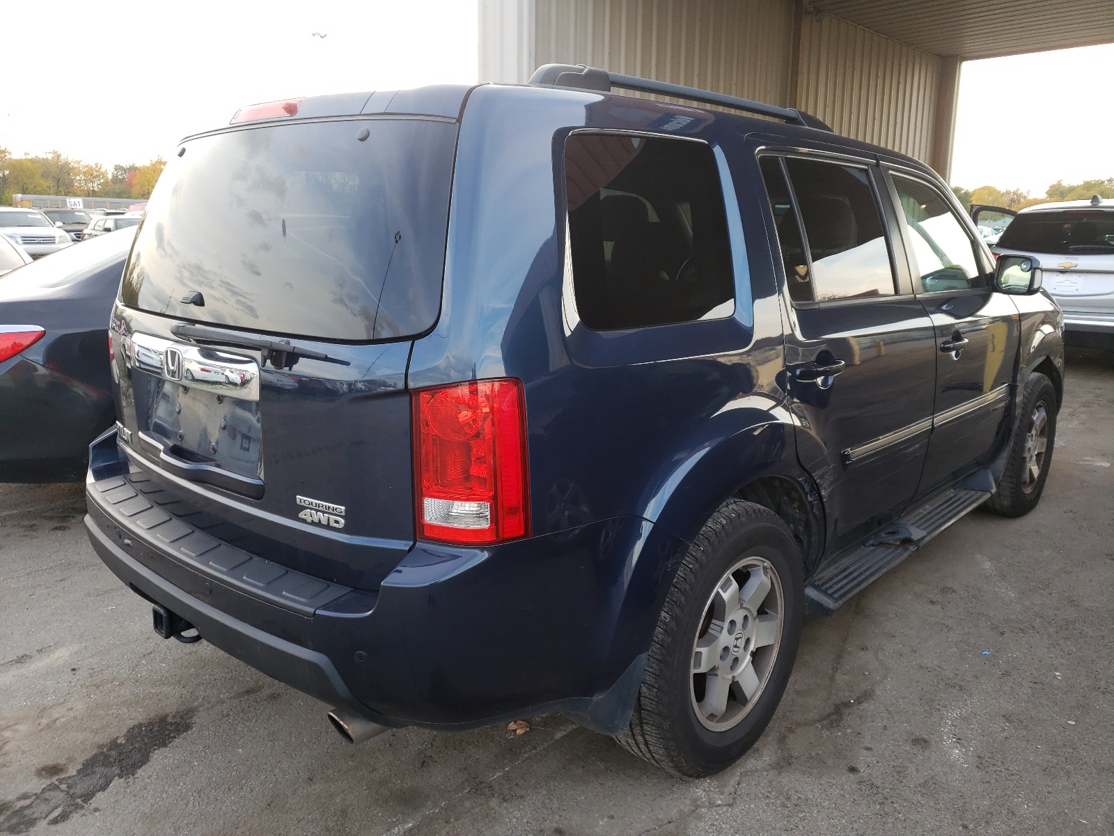 Photo 4 from auction – 2010 HONDA PILOT TOUR with VIN 5FNYF4H90AB003642