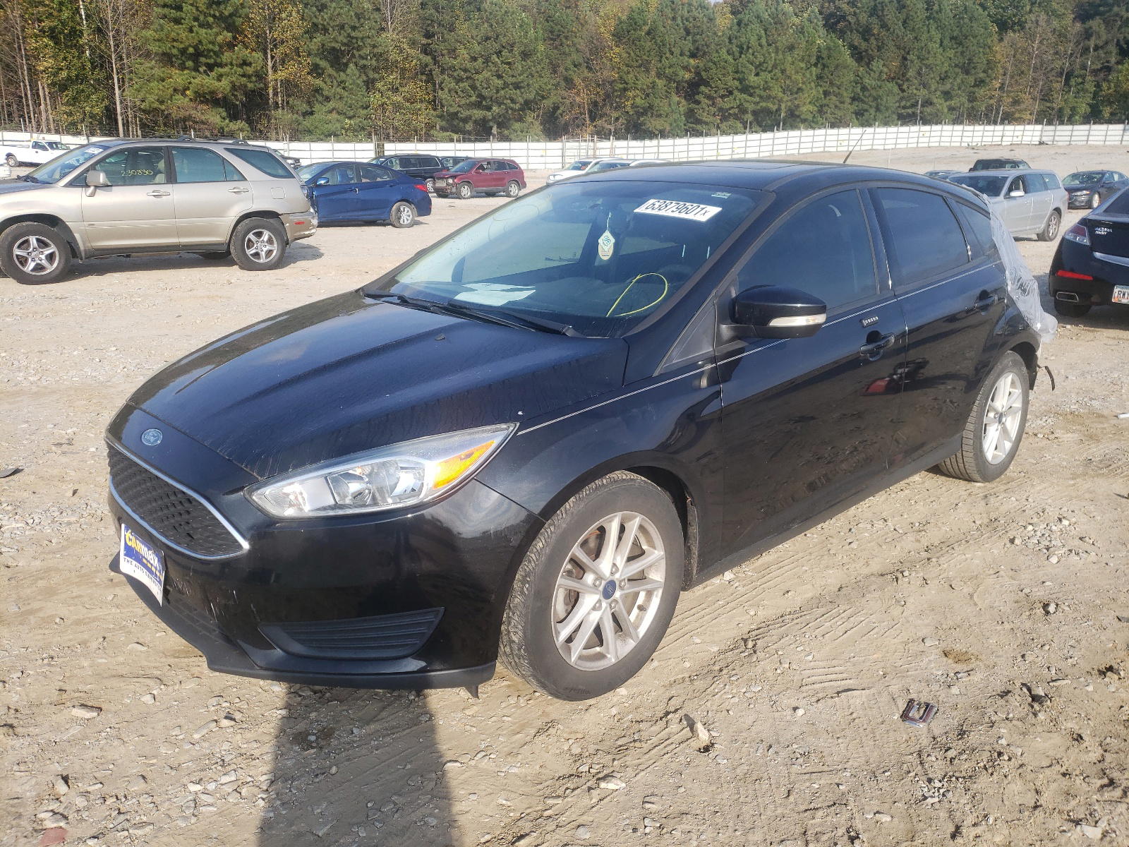 Photo 2 from auction – 2015 FORD FOCUS SE with VIN 1FADP3K22FL292180