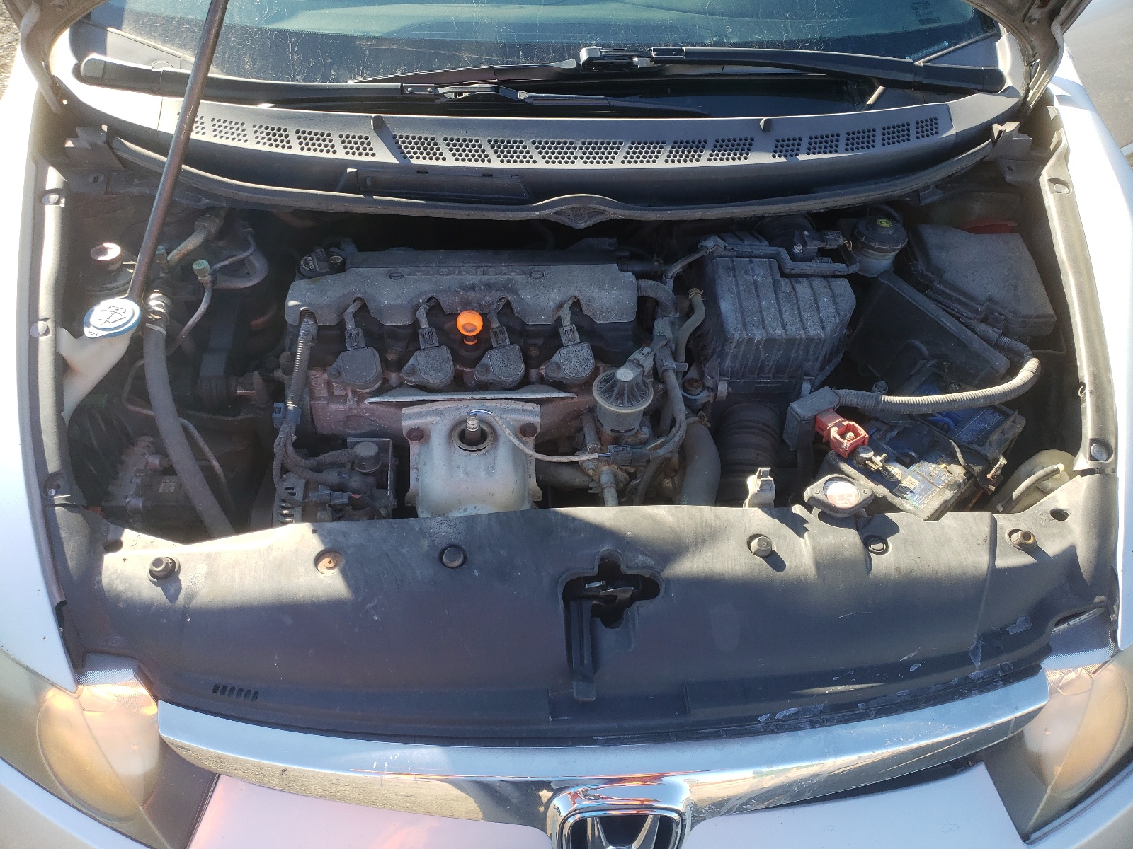 Photo 7 from auction – 2007 HONDA CIVIC DX with VIN 2HGFA16377H006156