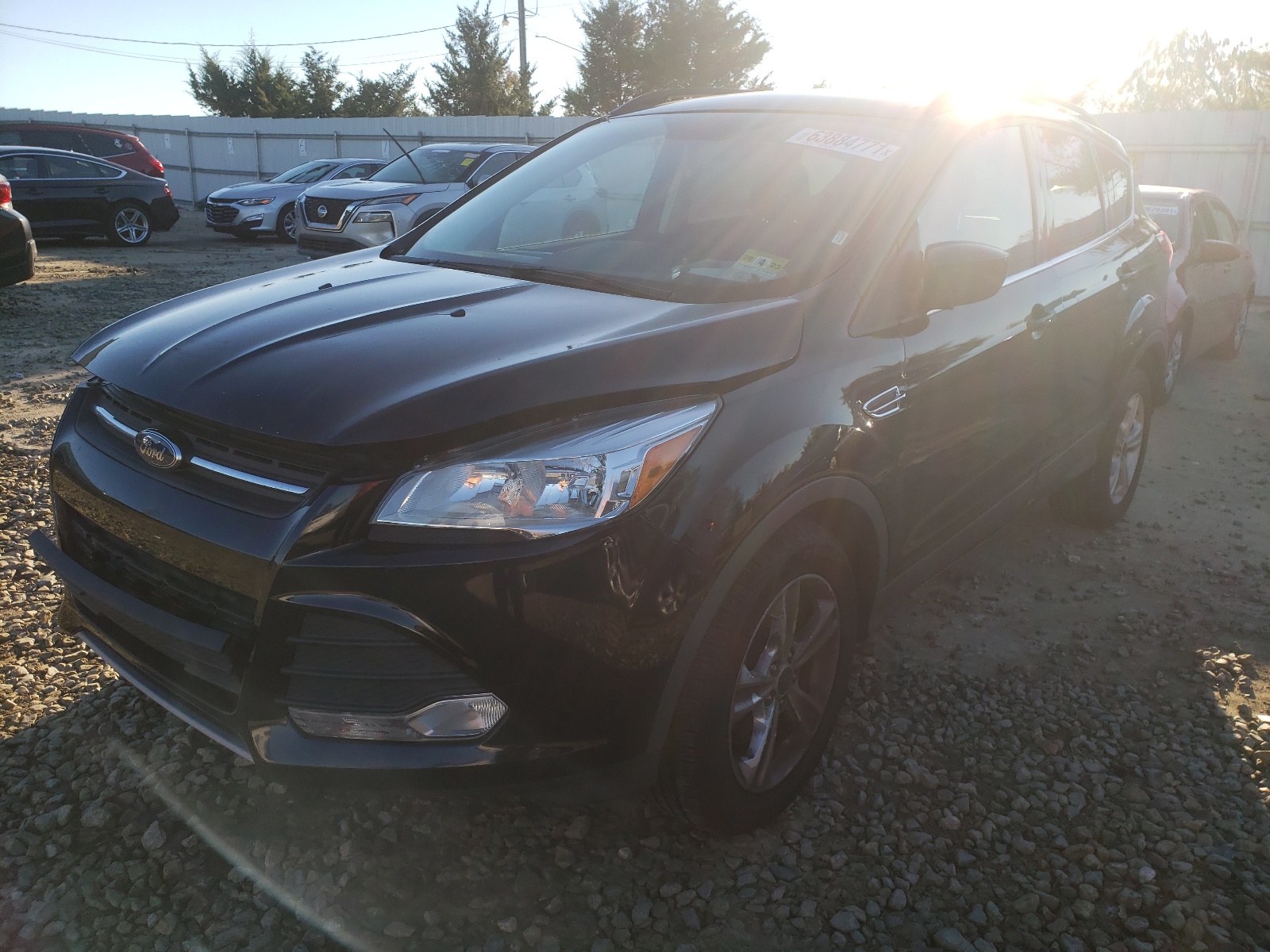 Photo 2 from auction – 2016 FORD ESCAPE SE with VIN 1FMCU9GX4GUC48291