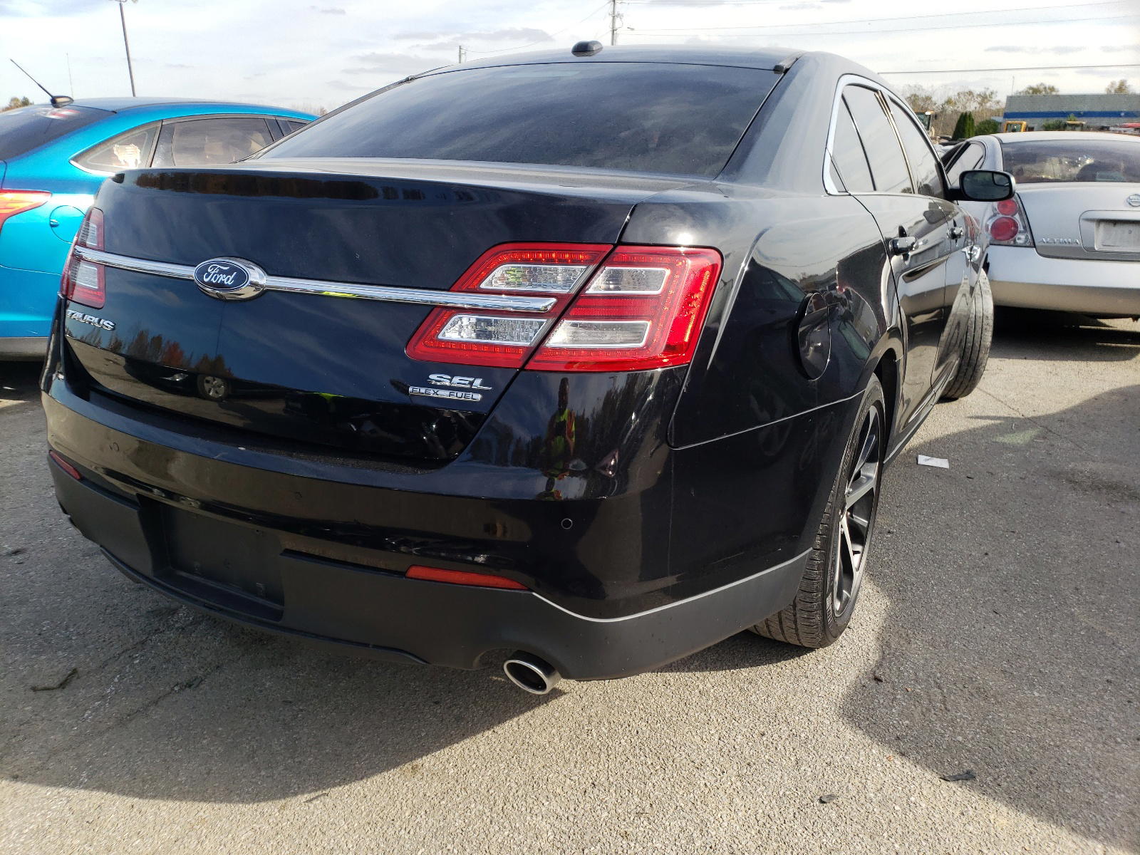 Photo 4 from auction – 2016 FORD TAURUS SEL with VIN 1FAHP2E88GG153581