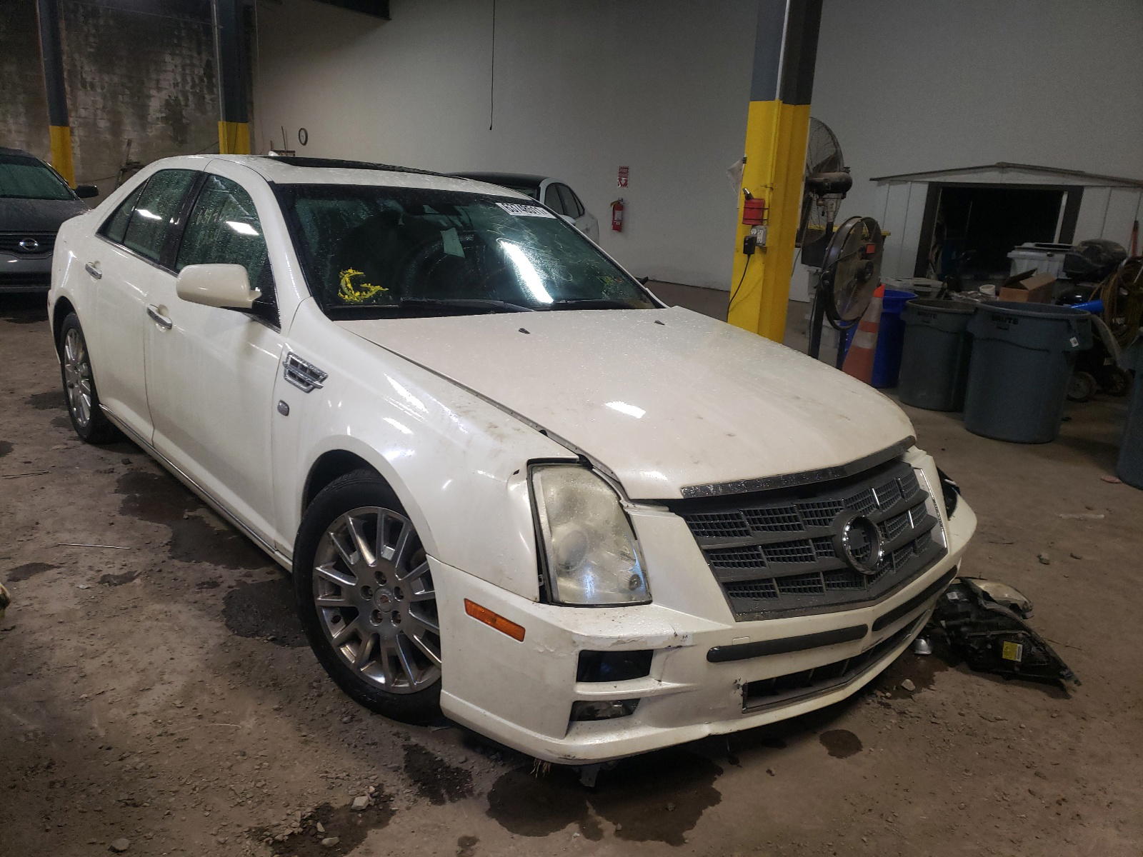 CADILLAC STS 2010 with VIN 1G6DU6EV8A0143831 - Photo from auction
