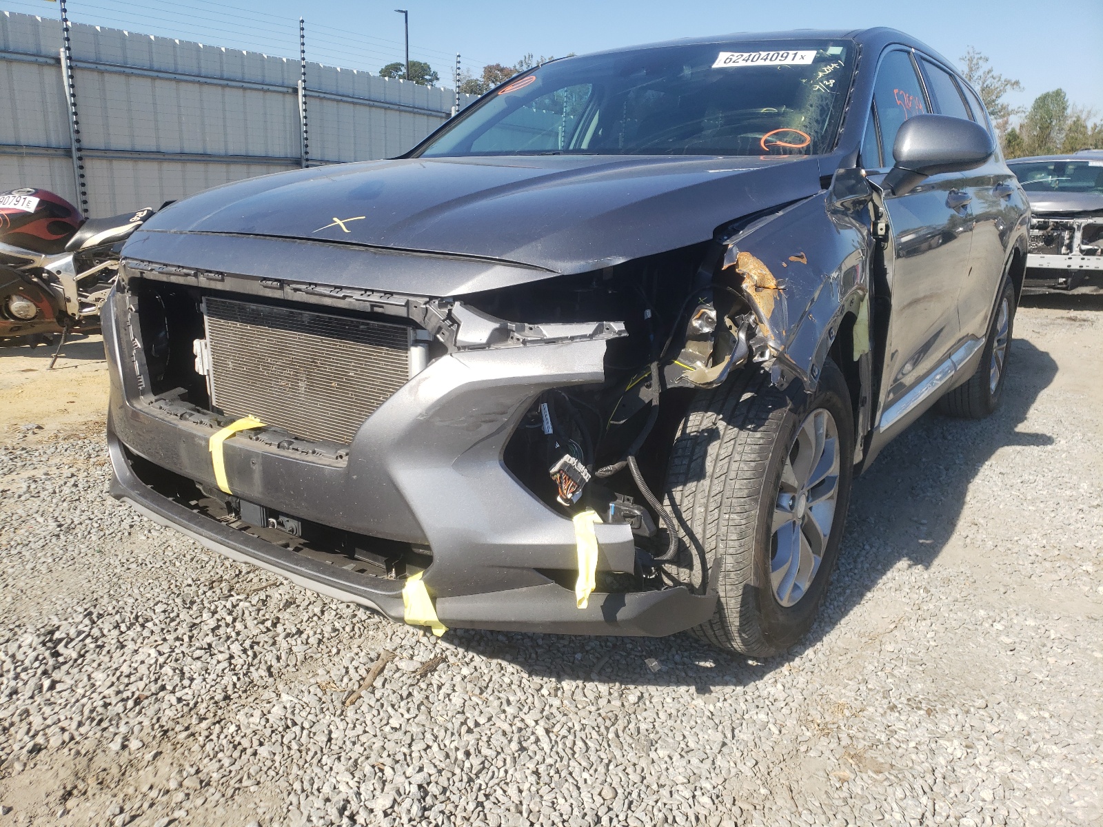 Photo 2 from auction – 2019 HYUNDAI SANTA FE S with VIN 5NMS2CAD5KH097253