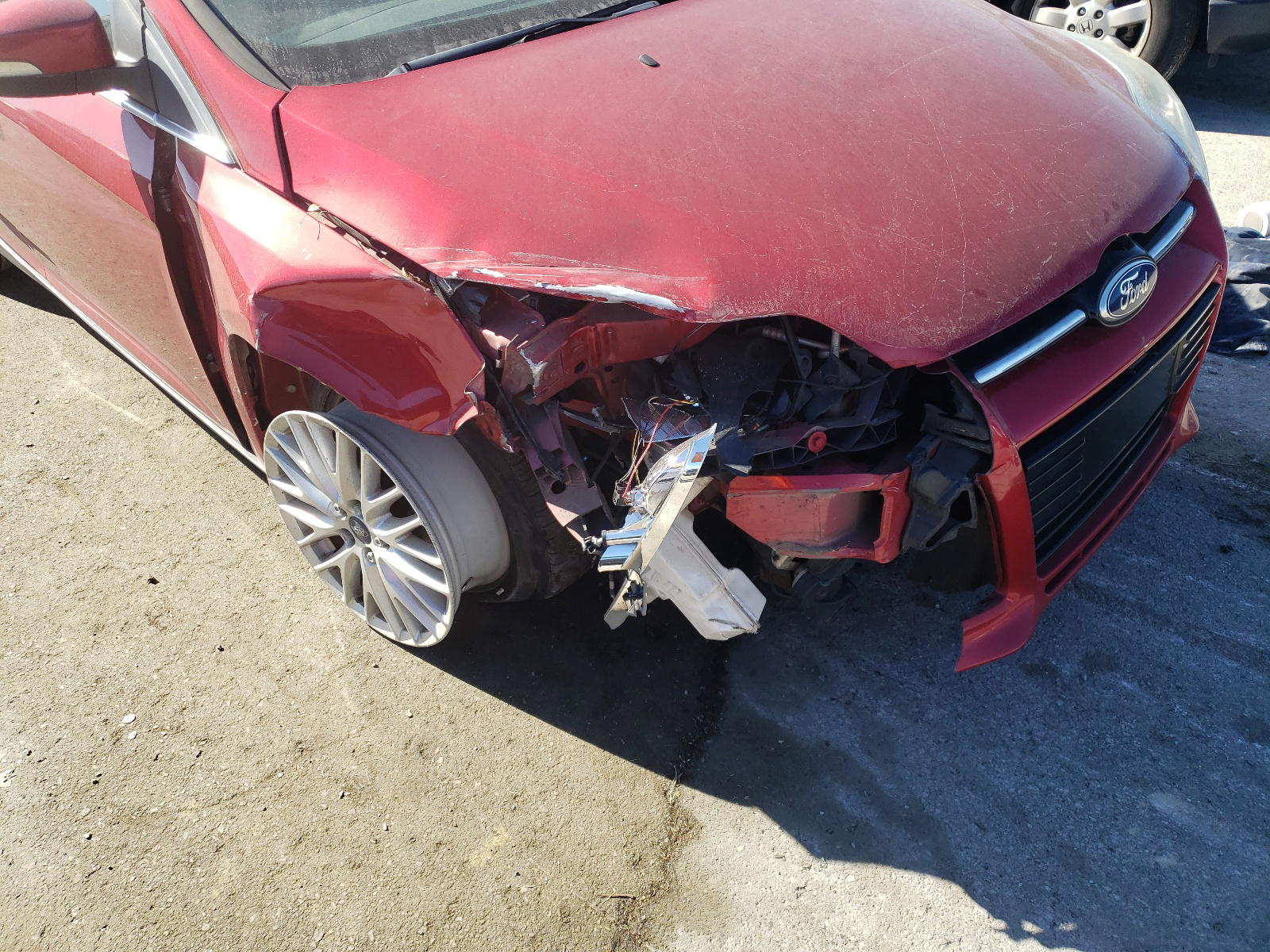 Photo 9 from auction – 2012 FORD FOCUS with VIN 1FAHP3H21CL104740