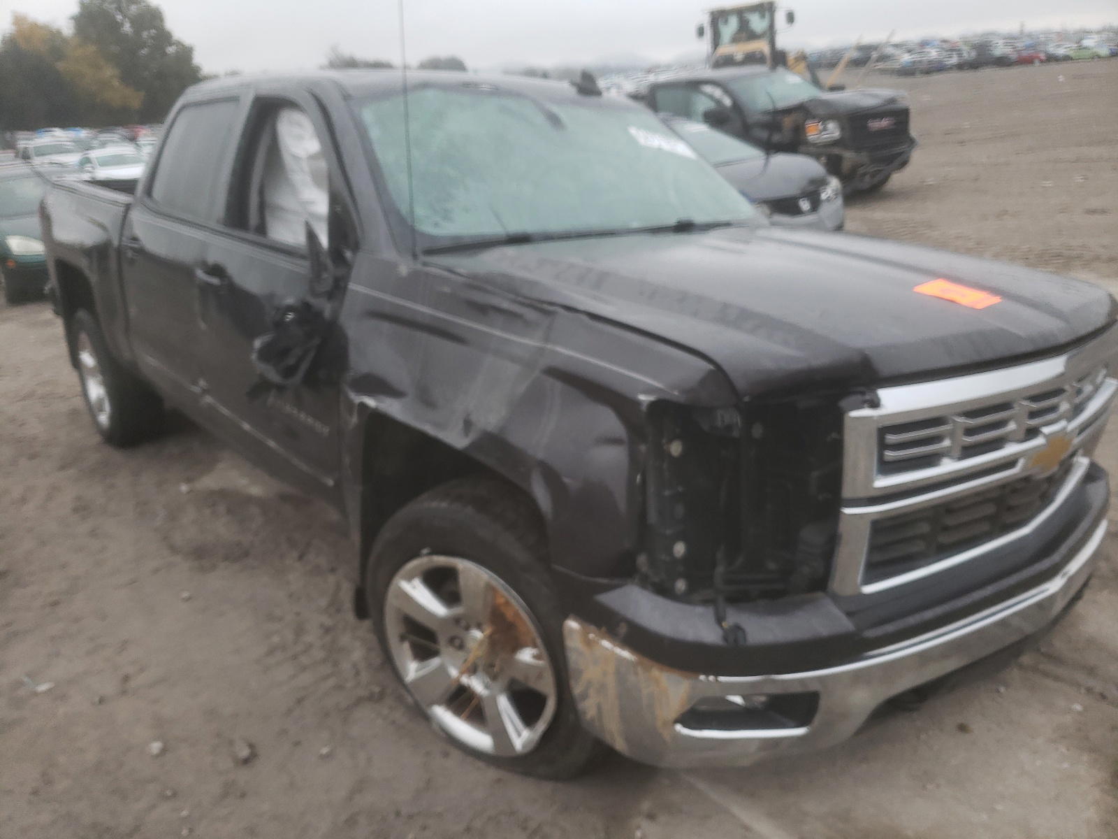 CHEVROLET SILVERADO 2015 with VIN 3GCUKREC5FG214490 - Photo from auction