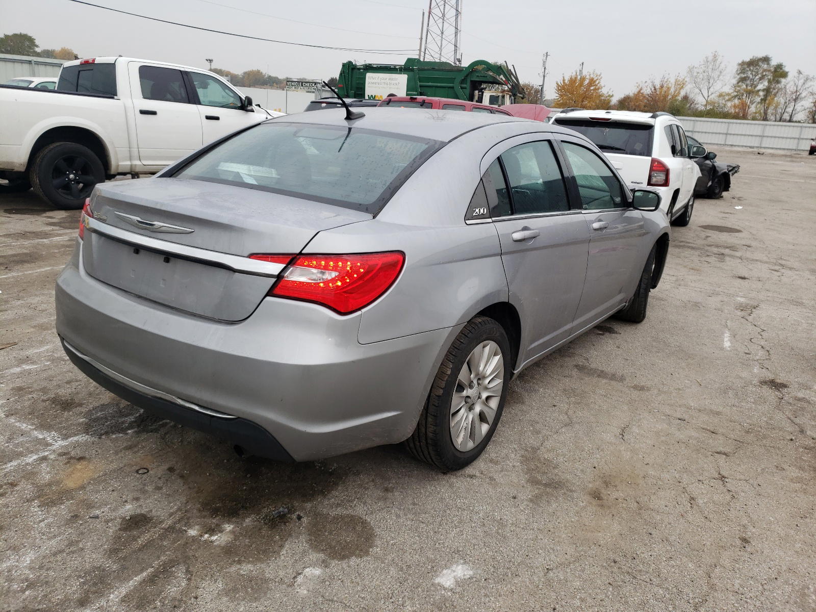 Photo 4 from auction – 2014 CHRYSLER 200 LX with VIN 1C3CCBAB4EN123220