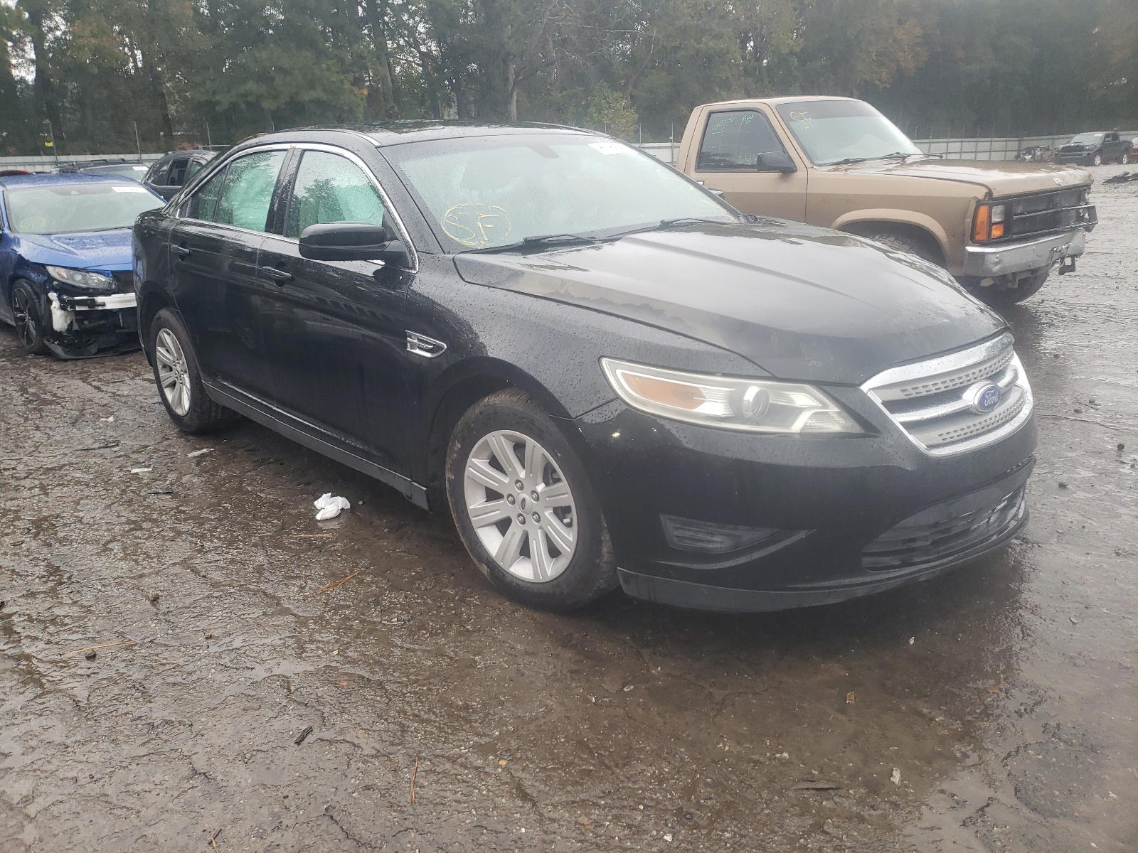FORD TAURUS SE 2012 with VIN 1FAHP2DW7CG125717 - Photo from auction