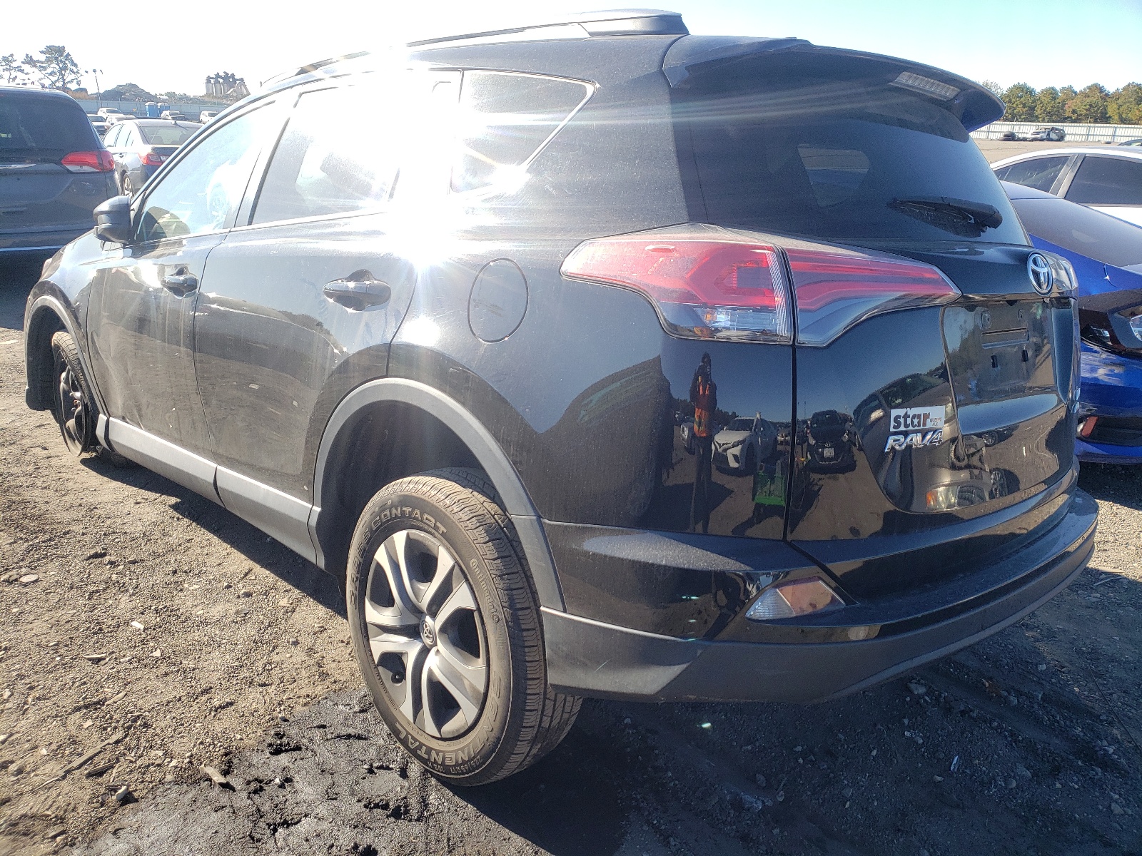 Photo 3 from auction – 2018 TOYOTA RAV4 LE with VIN 2T3BFREVXJW744248
