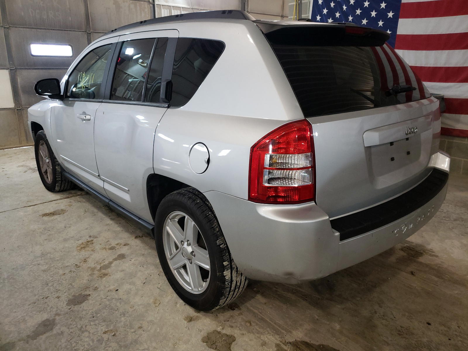 Photo 3 from auction – 2010 JEEP COMPASS SP with VIN 1J4NT4FB7AD506460