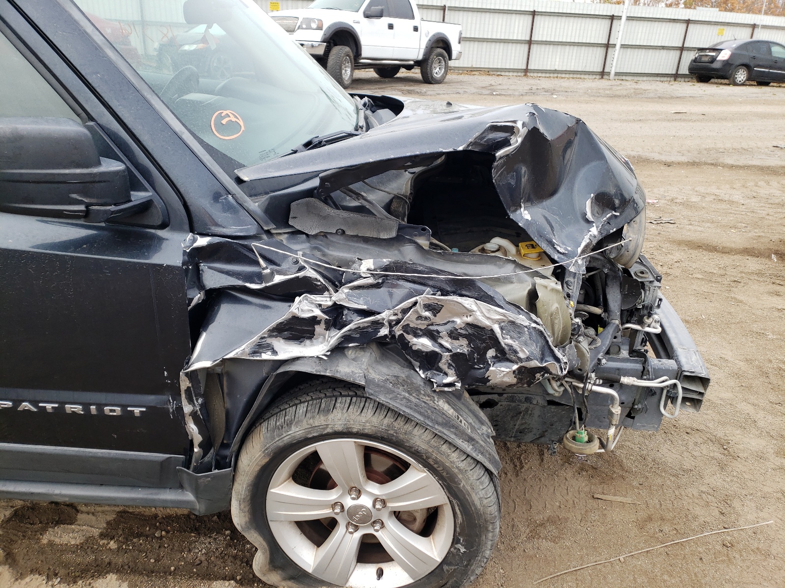 Photo 9 from auction – 2014 JEEP PATRIOT SP with VIN 1C4NJPBB6ED560955