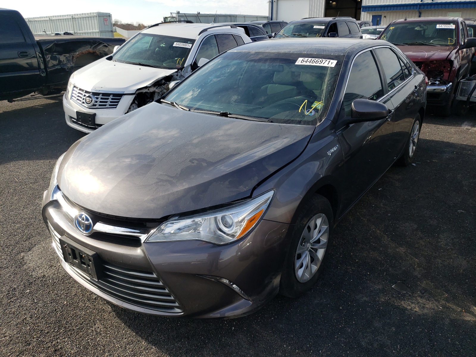 Photo 2 from auction – 2016 TOYOTA CAMRY HYBR with VIN 4T1BD1FK8GU193900