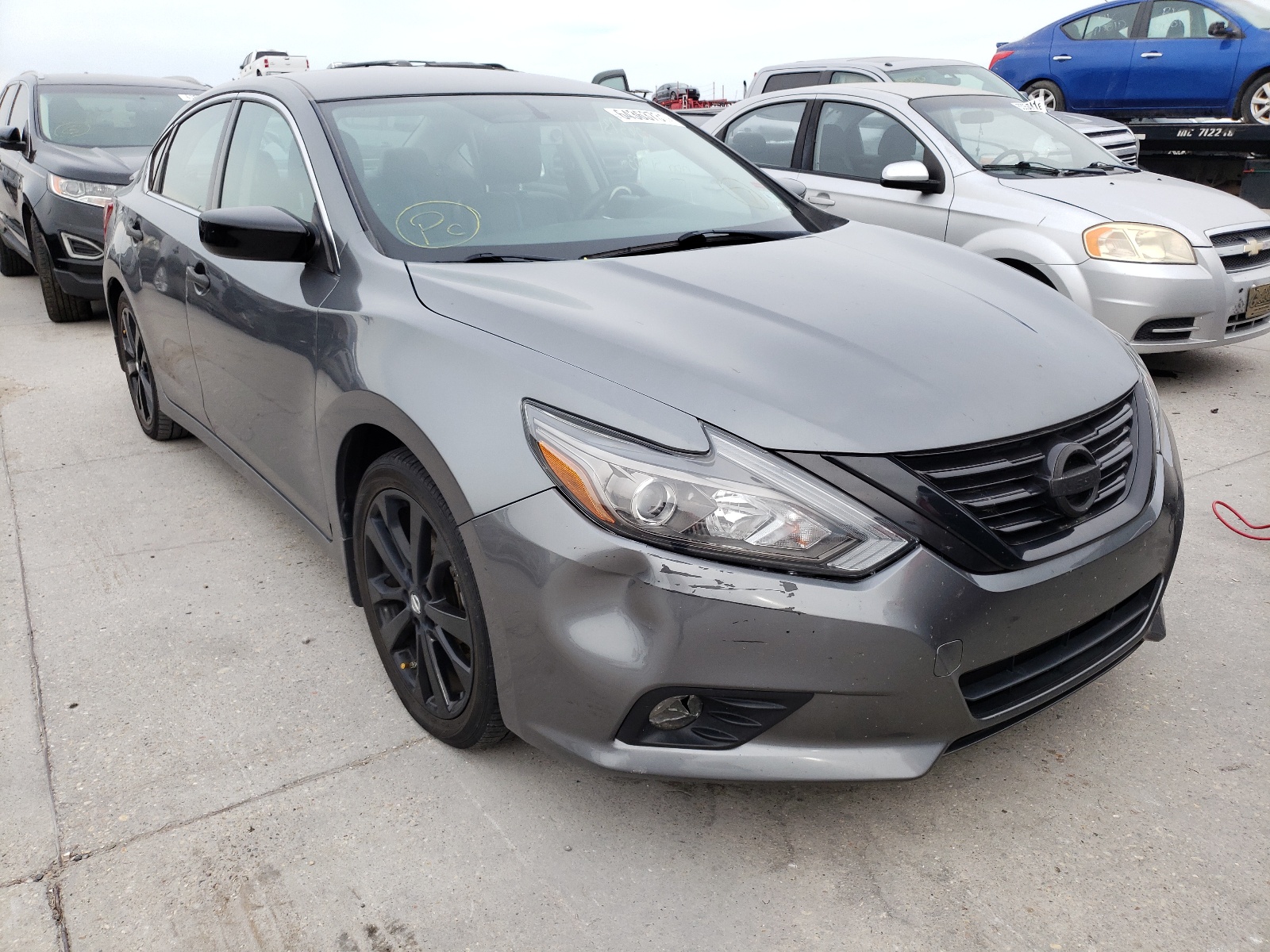 NISSAN ALTIMA 2.5 2018 with VIN 1N4AL3AP2JC182461 - Photo from auction