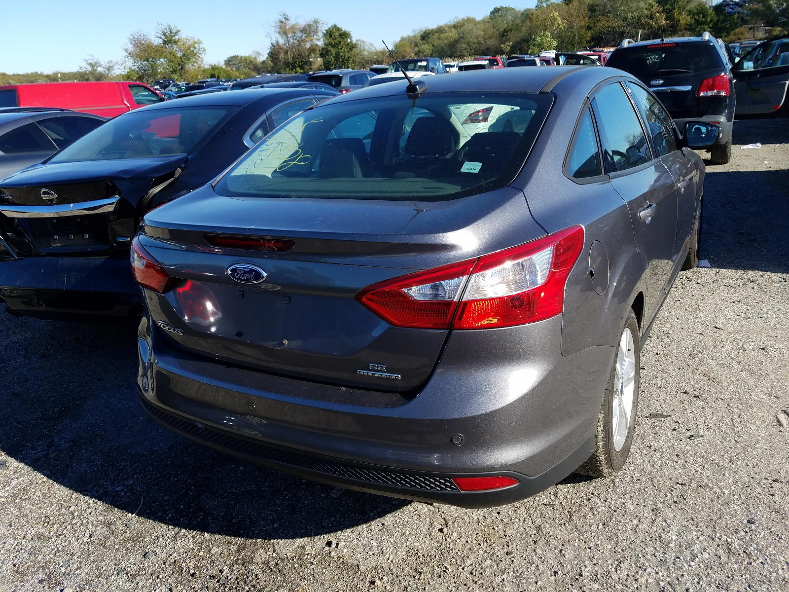Photo 4 from auction – 2014 FORD FOCUS SE with VIN 1FADP3F29EL193977