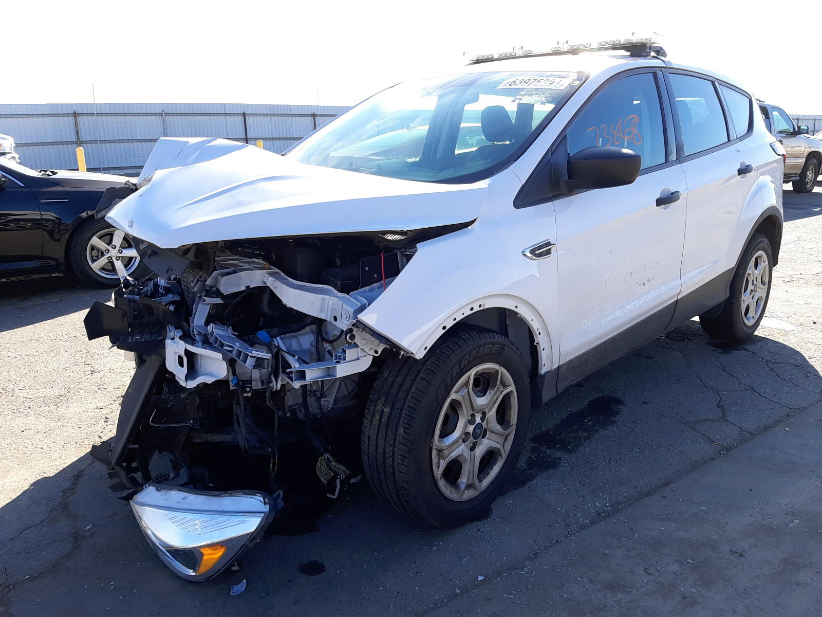 Photo 2 from auction – 2019 FORD ESCAPE S with VIN 1FMCU0F78KUB68577