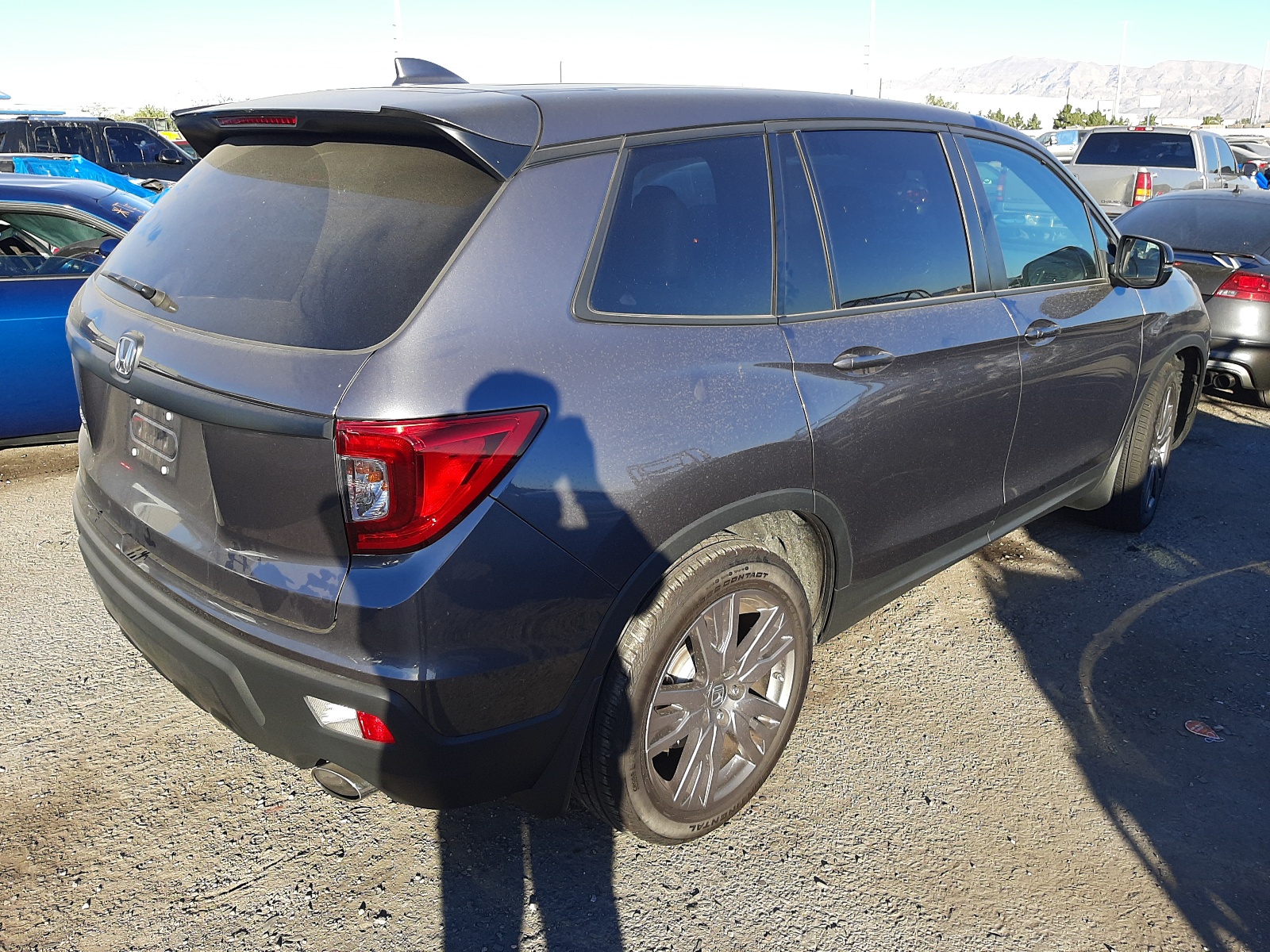 Photo 4 from auction – 2020 HONDA PASSPORT E with VIN 5FNYF7H54LB003984