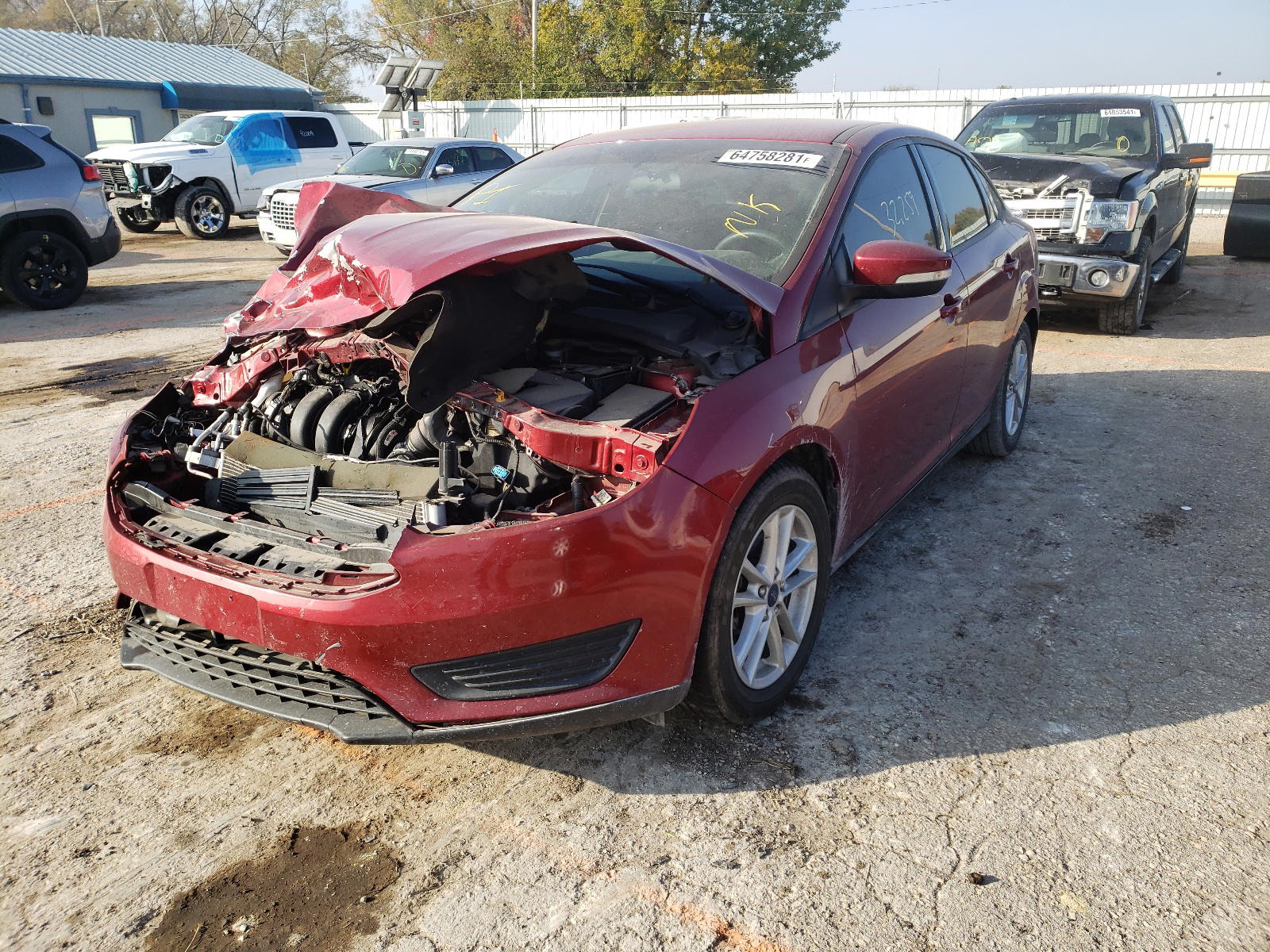 Photo 2 from auction – 2016 FORD FOCUS SE with VIN 1FADP3F23GL301027